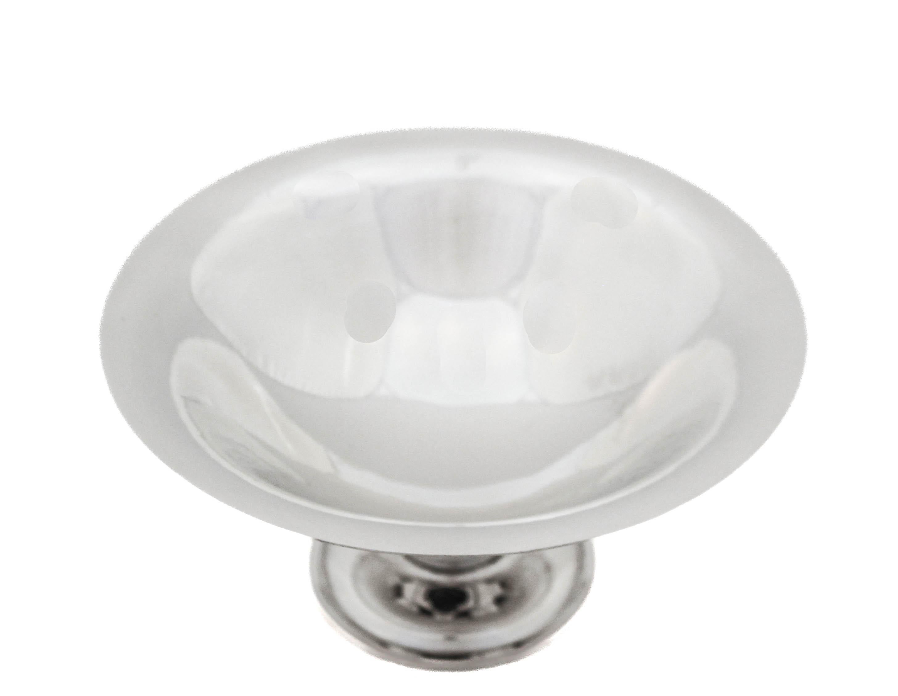Being offered is a pair of sterling silver compotes made in Denmark.  They are lightly hammered with a Jensen-esque style and design.  The pedestal is hollow and has a Mid-Century style that connects the base and top.  Perfect for your coffee table