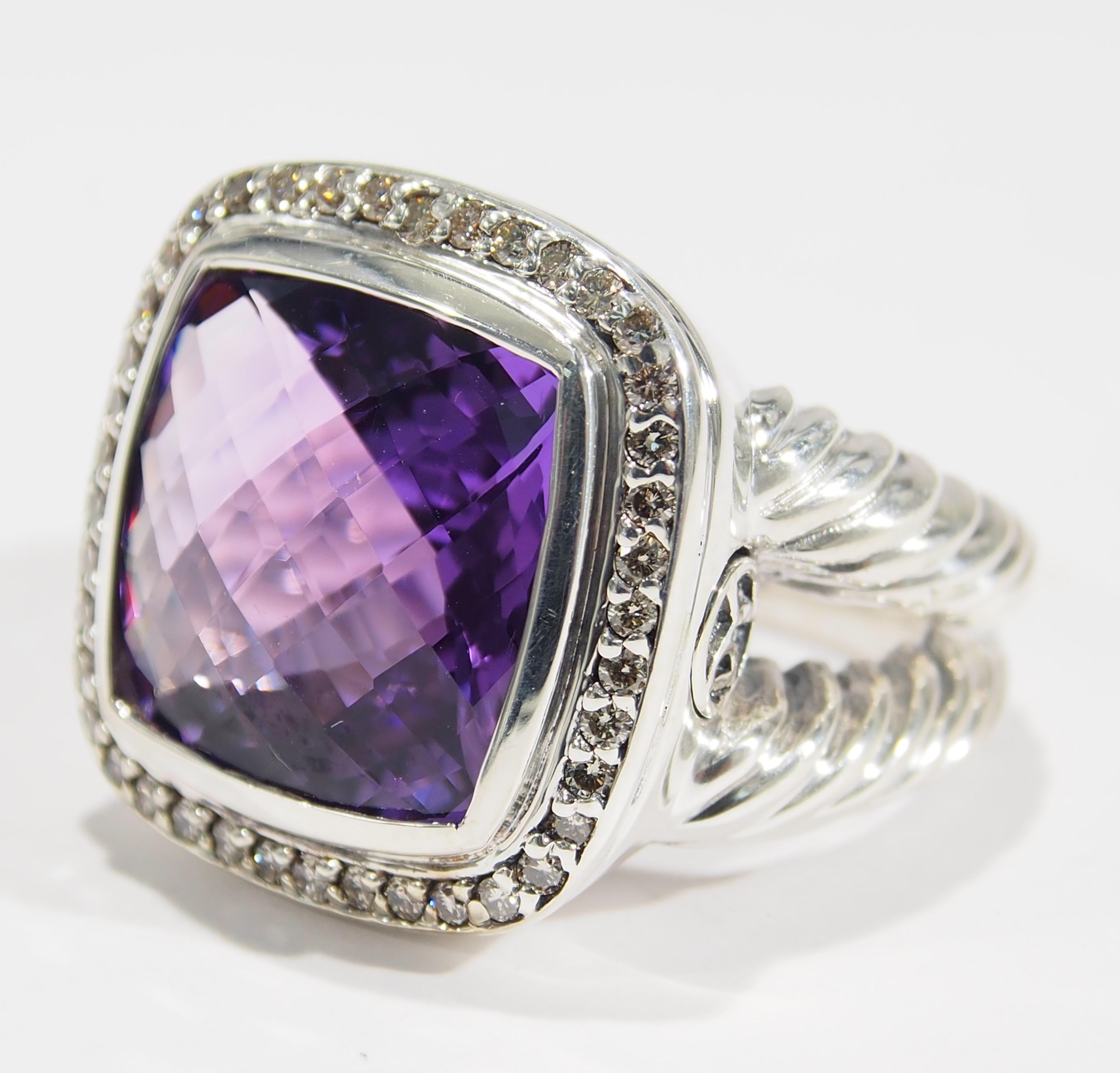 From one of America's favorite designers, David Yurman is his Sterling Silver Albion Ring. The Ring features a faceted 14x14mm Amethyst surrounded by (42) Round Brilliant Cut Diamonds, approximately 0.30ctw, G-J in Color, VS in Clarity. Easily worn