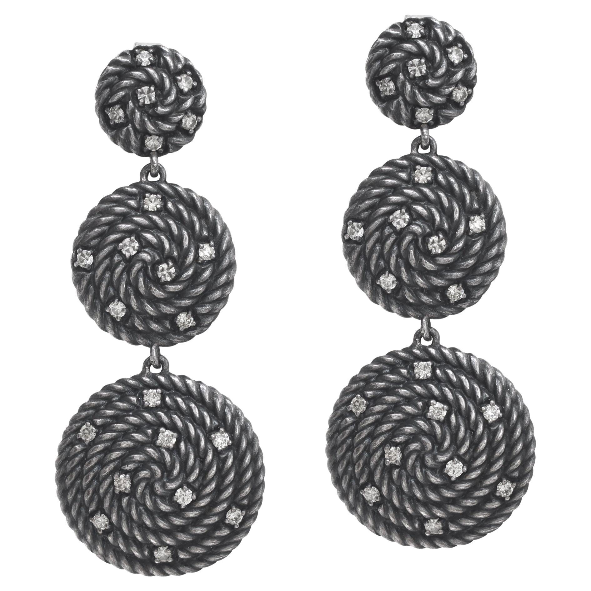 Sterling silver David Yurman coil earrings with diamonds