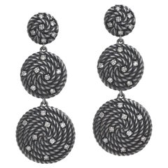 Sterling silver David Yurman coil earrings with diamonds