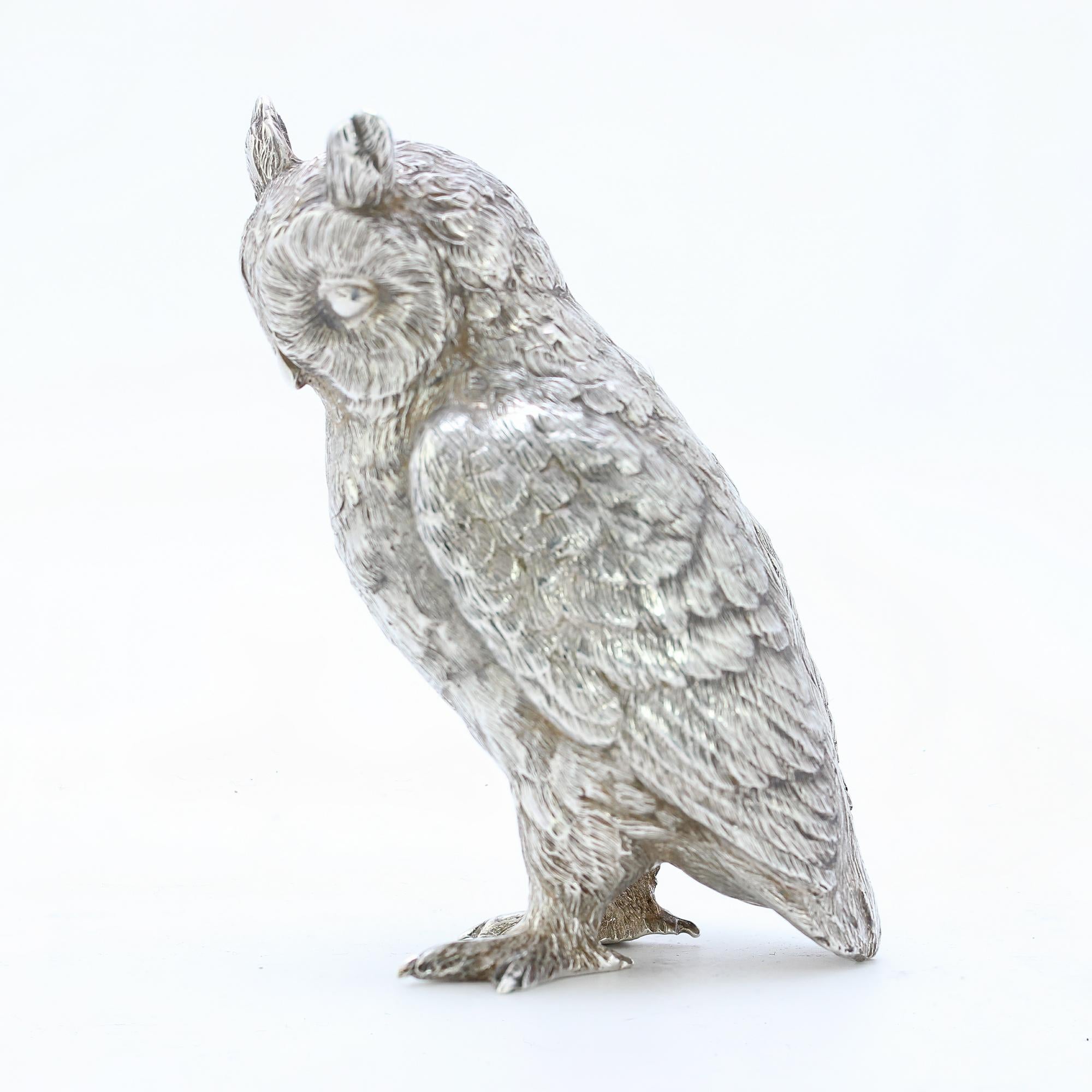 silver owl statue