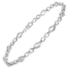 Bracciale con diamanti in argento sterling a forma di pera e infinito alternato