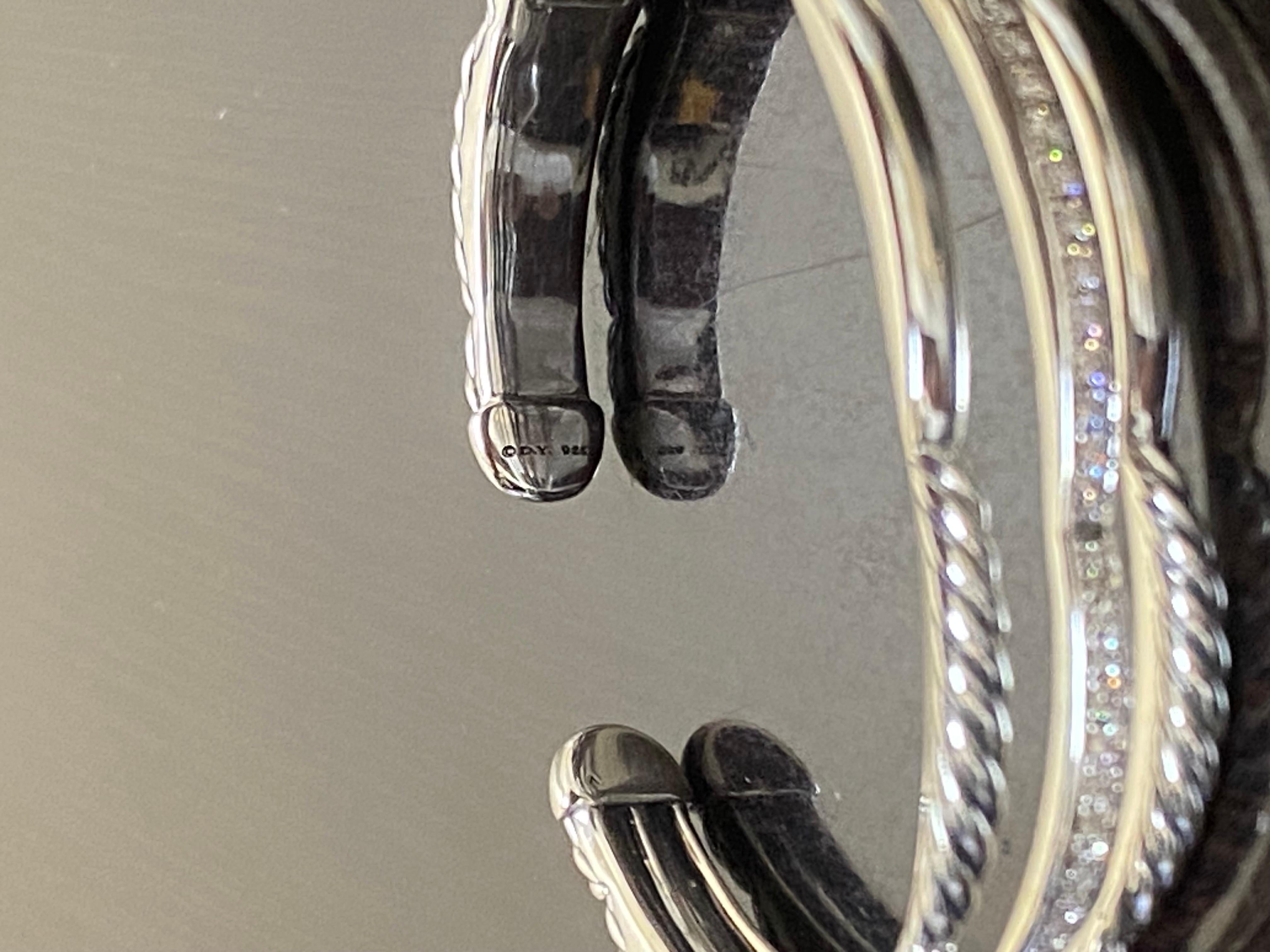 DeKara Designs Desinger Collection

Metal- Sterling Silver, .925.

Stones- 48 Round Diamonds G-H Color VS2 Clarity 0.61 Carats.

RARE Authentic Pave Diamond David Yurman Handmade Sterling Silver Cuff Bracelet From the Tides Collection. It truly