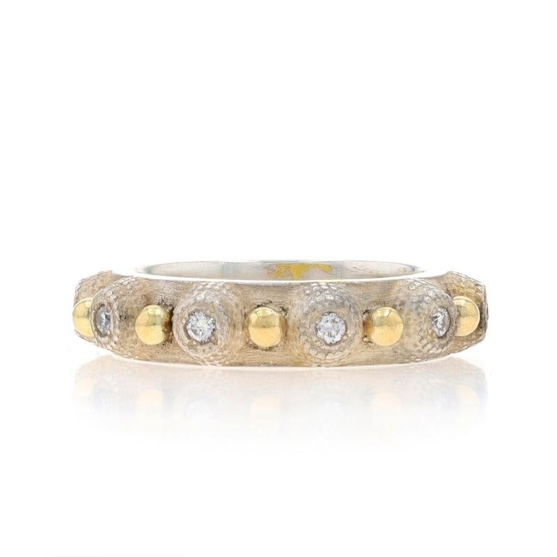 Size: 6

Metal Content: Sterling Silver & 14k Yellow Gold

Stone Information
Natural Diamonds
Carat(s): .25ctw
Cut: Round Brilliant
Color: F - G
Clarity: SI1 - SI2

Total Carats: .25ctw

Style: Eternity Band
Features: Stackable Design with Textured