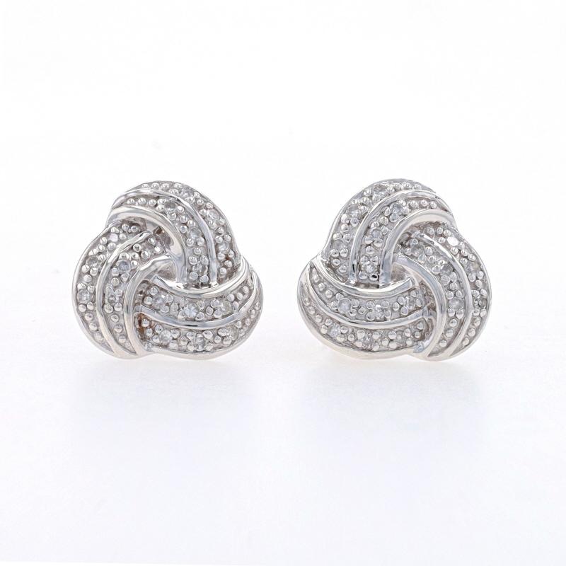 Metal Content: Sterling Silver

Stone Information

Natural Diamonds
Carat(s): .10ctw
Cut: Single
Color: G - H
Clarity: VS2 - SI1

Total Carats: .10ctw

Style: Stud
Fastening Type: Butterfly Closures
Theme: Love Knot

Measurements

Tall: 13/32