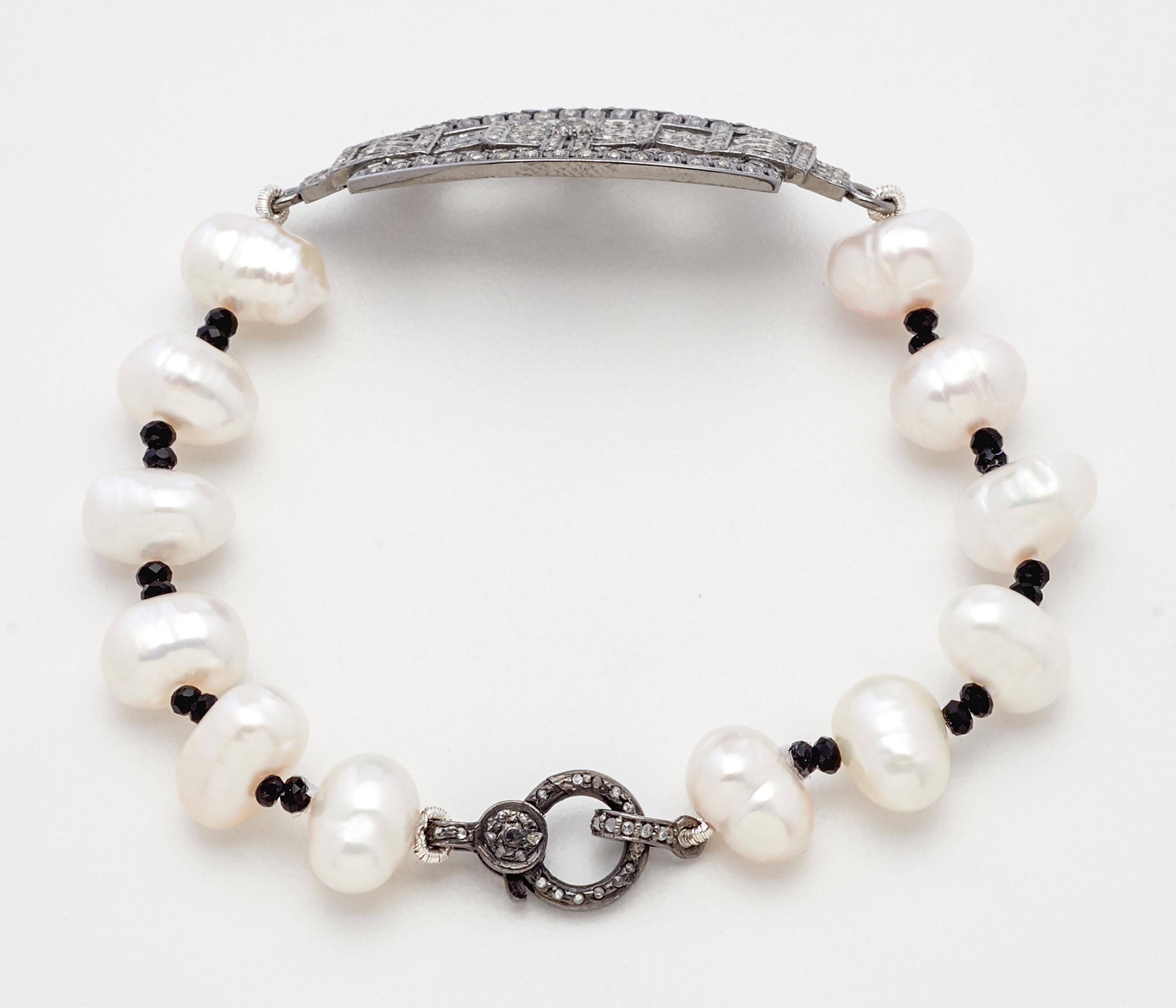 Artisan created, this beautiful art deco inspired diamond covered sterling silver placket bracelet with natural Akoya pearls and black spinel crystal beads beautifully adorns the wrist and is a versatile design that transcends most personal tastes.