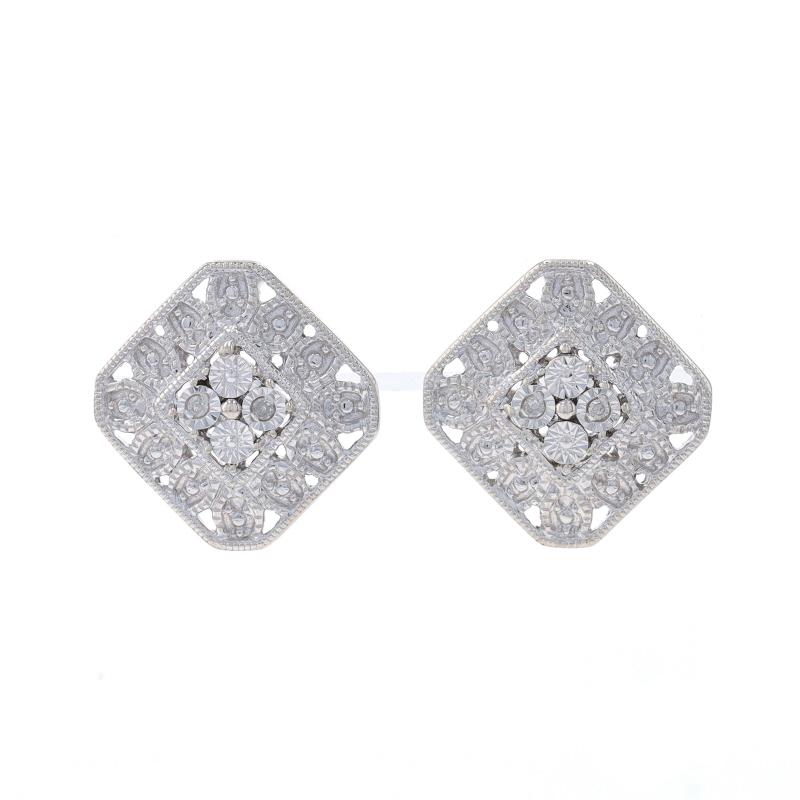 Metal Content: Sterling Silver

Stone Information

Natural Diamonds
Cut: Single
Stone Note: (four small accents)

Style: Stud
Fastening Type: Butterfly Closures
Features: Open cut design with etched & milgrain detailing

Measurements

Tall: 17/32