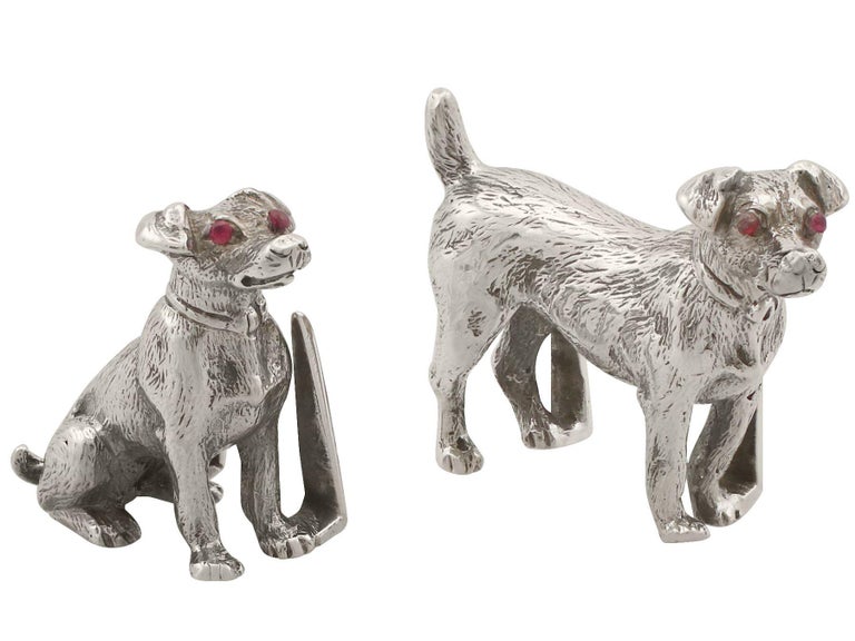 An exceptional, fine and impressive, rare pair of antique George V English 'Dog' sterling silver menu / card holders, boxed, an addition to our diverse dining silverware collection

These exceptional and rare antique cast sterling silver menu or
