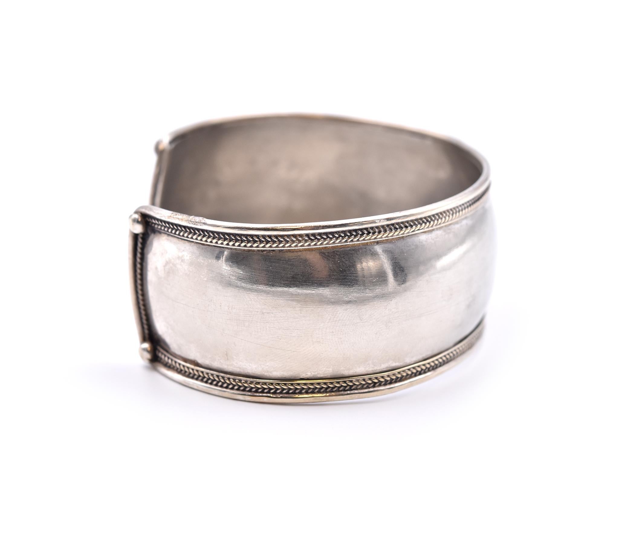Designer: custom
Material: sterling silver
Dimensions: cuff will fit up to a 7.5-inch wrist, cuff measures 28mm wide
Weight: 20.9 grams