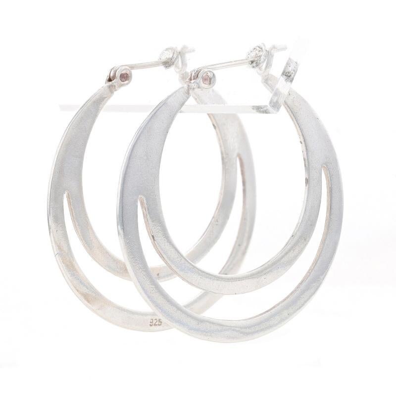 Metal Content: Sterling Silver

Style: Hoop
Fastening Type: Snap Closures
Theme: Double Circle, Crescent

Measurements

Tall: 1 3/16