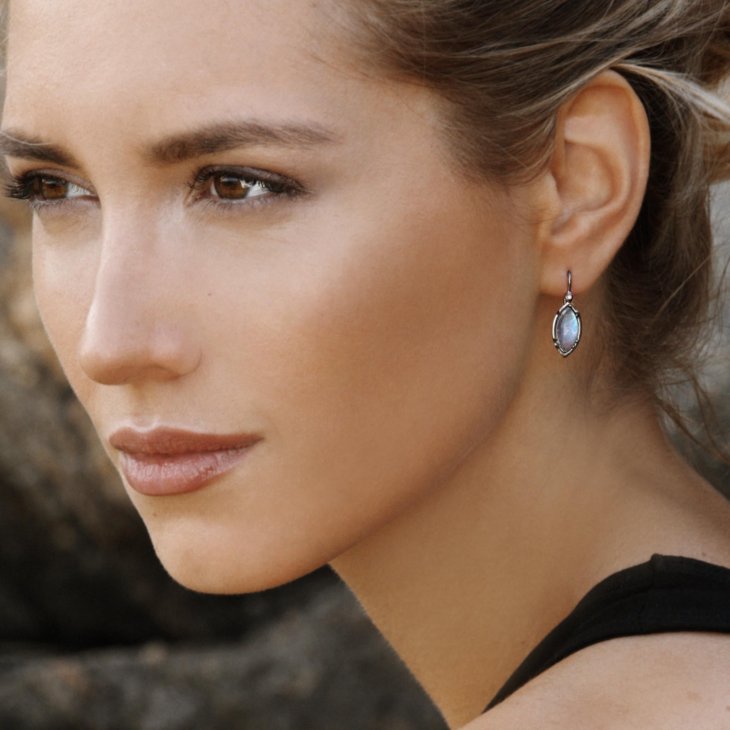 The Doe drop earring is a super go to earring for any occasion. In blackened sterling silver, it is stylish and low key with a gorgeous glow on the rose cut moonstone. Diamond accent on the hook.

Sterling silver
Moonstone (rose cut)
Diamond
