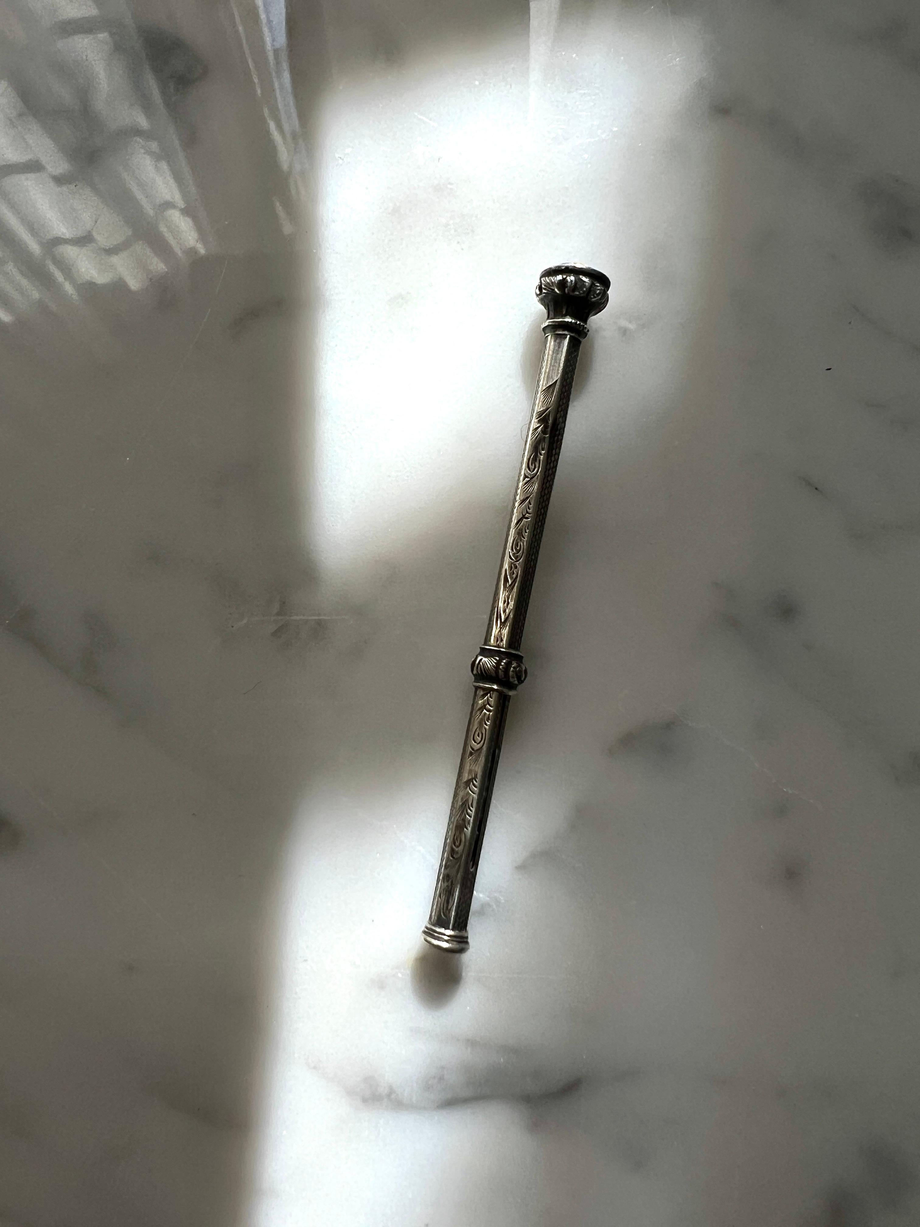 A beautiful retractable graphite Pencil - a lovely decorative piece for the desk, but also still fully functional.  The handle is
Silver plate - The tip has a beautiful Citrine Stone that gives it a bit of sophistication... we love this little