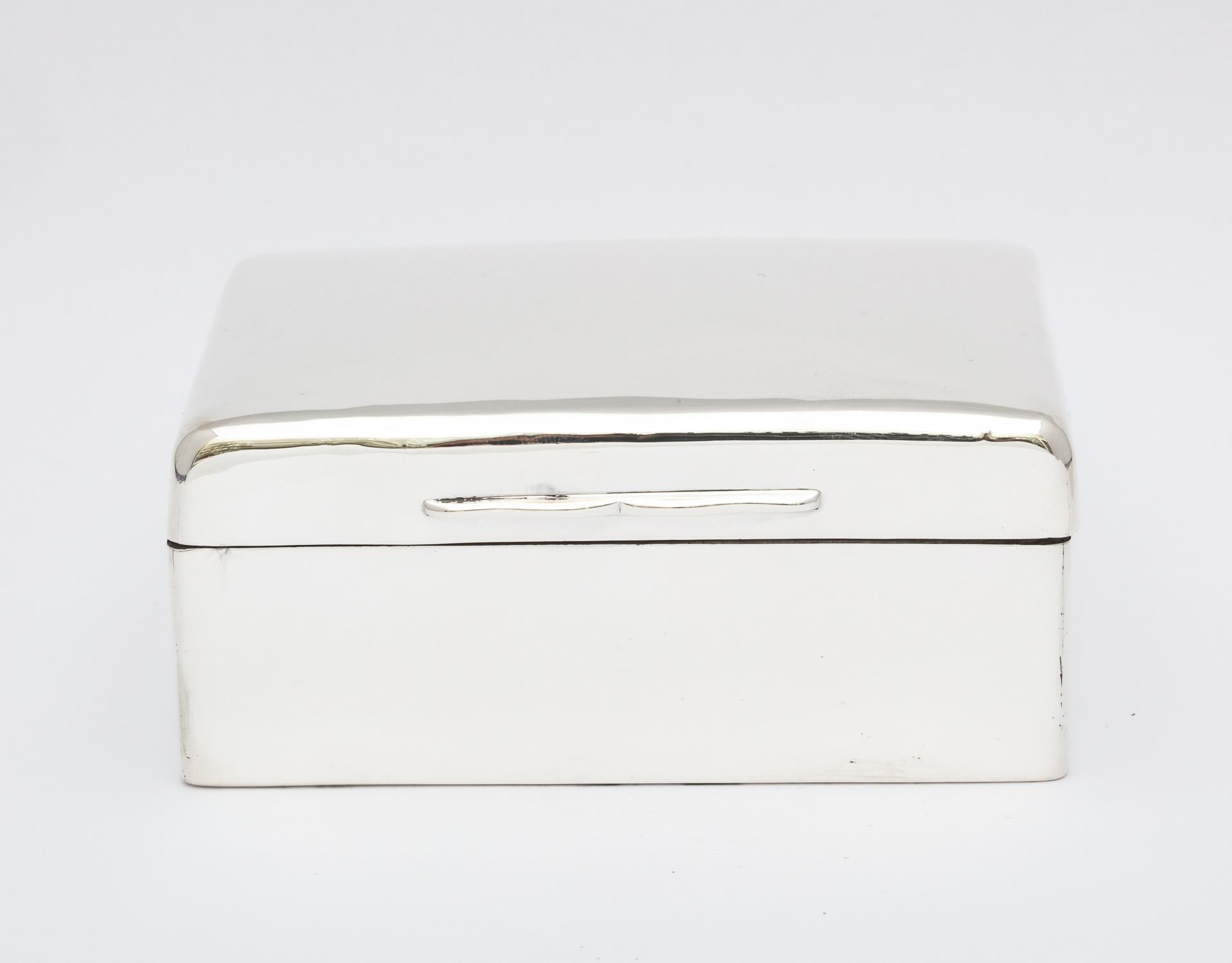 Sterling silver, Anglo-Indian (made for the Indian market) table box, London, 1915, Blackmore and Fletcher, Ltd. - makers. Retailed at Lahore, India. Hinged lid. Wood lined. Leather underside. Measures: 4 1/2 inches wide x 3 1/2 inches deep x 2