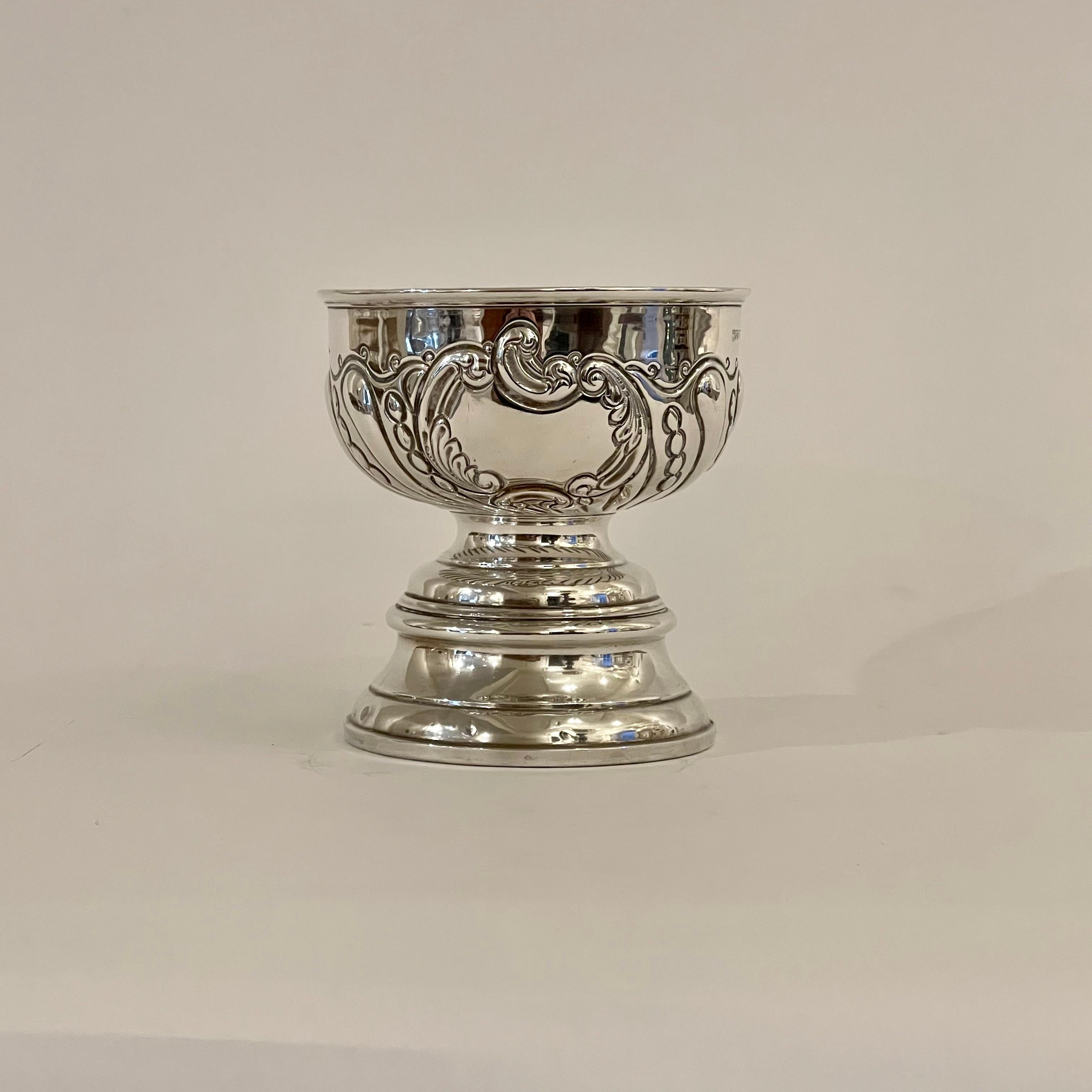 Made from solid Sterling Silver by Cooper Brothers & Sons of Sheffield in 1906, this Edwardian comport bowl is wonderfully decorated with organic Art Nouveau forms. With a wide pedestal base giving the piece a ‘Tazza’ style, the bowl is embossed