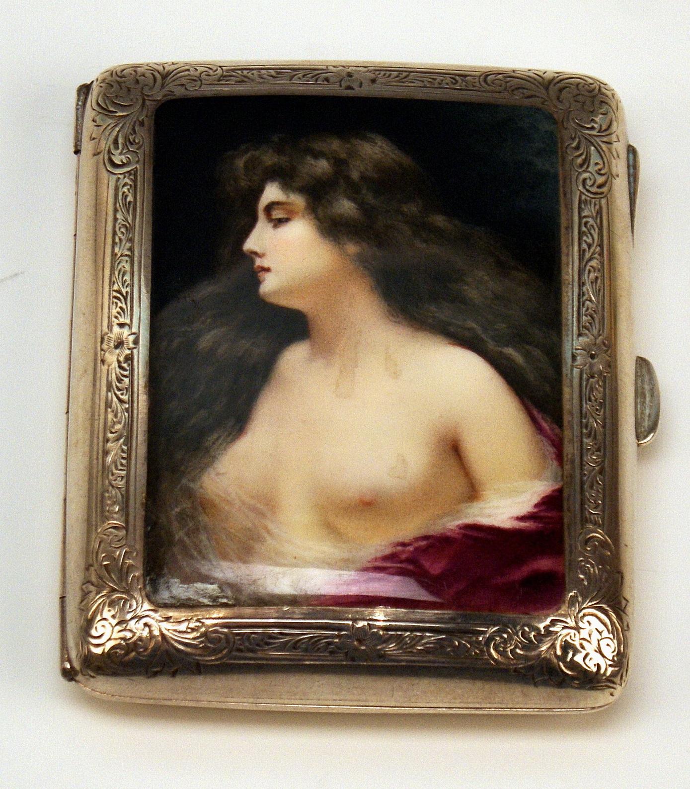 Stunning sterling silver 925 cigarette box / case with enamel painting covering lid:
View of a handsome long-haired lady, with bare-breasted upper body.

The lid is decorated with a finest enamel picture as mentioned above:
The lady's face