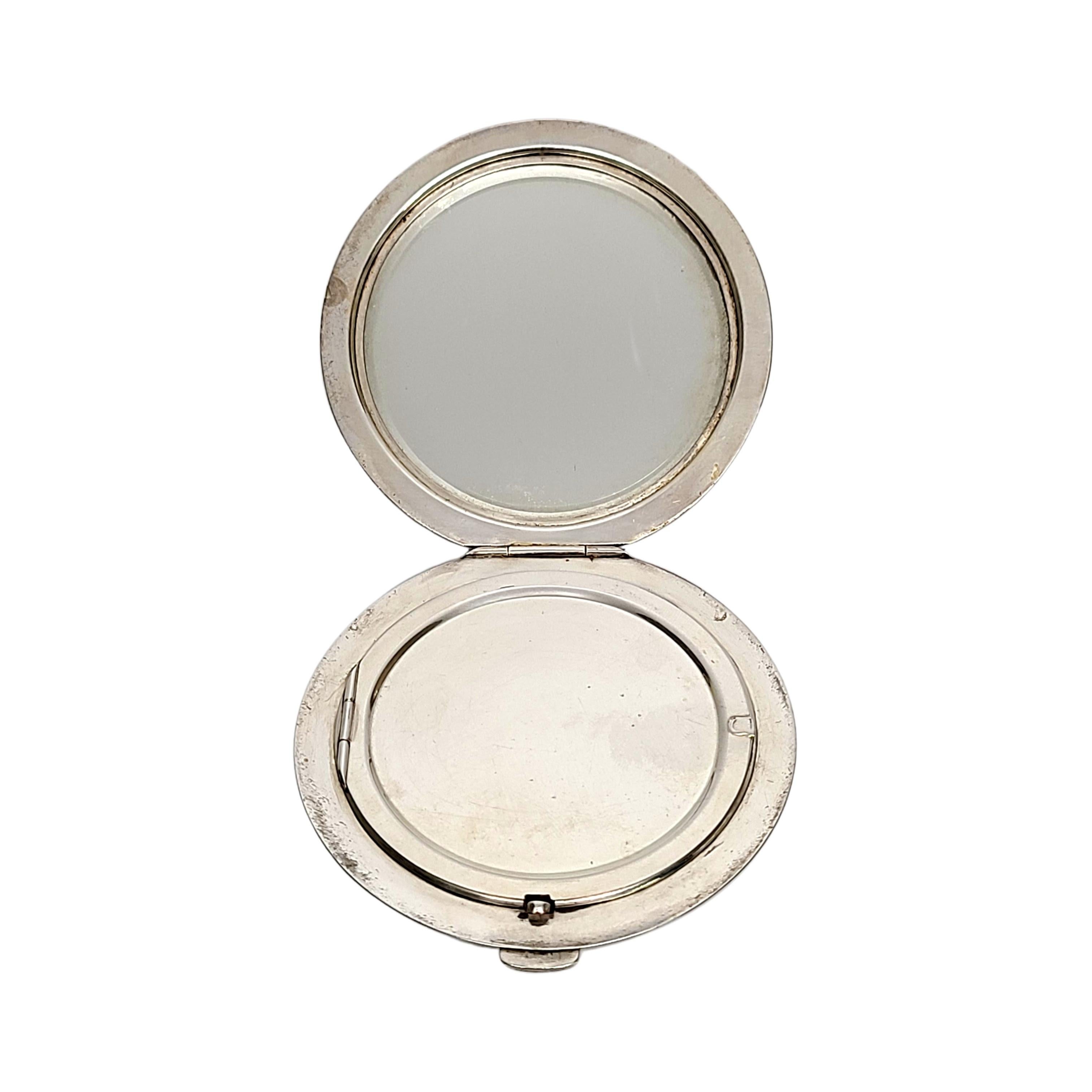 compact mirror