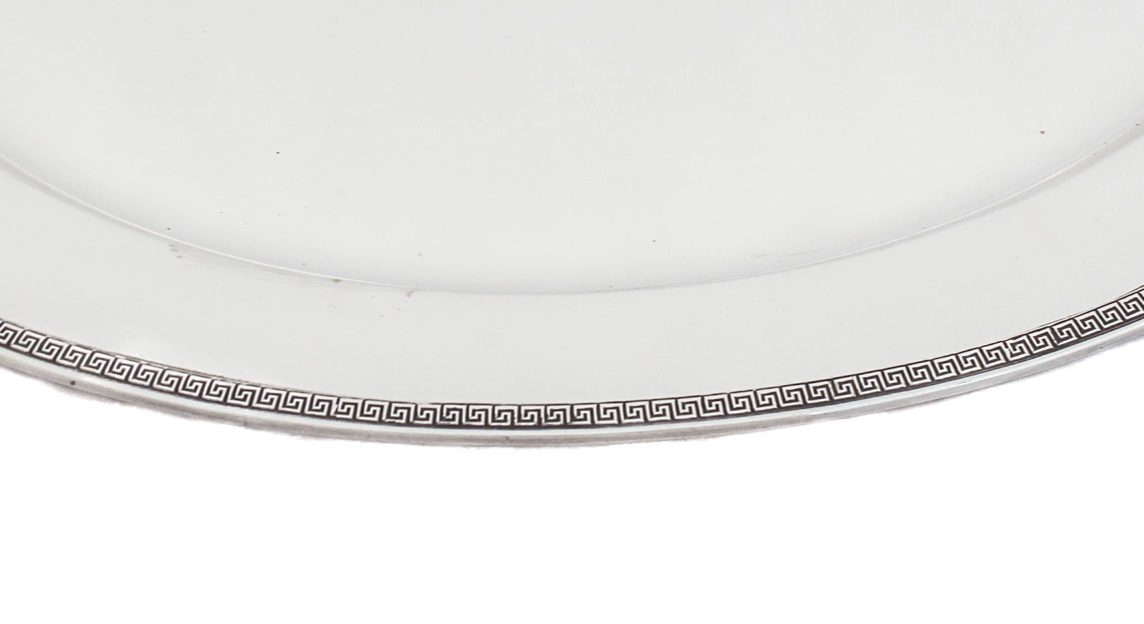 Being offered is a sterling silver platter by Gorham Silversmiths of Providence Rhode Island in the “Etruscan” pattern, hallmarked 1930.  The Etruscan Key pattern is a Greco-Roman revival pattern featuring a symmetrical design that included a Greek