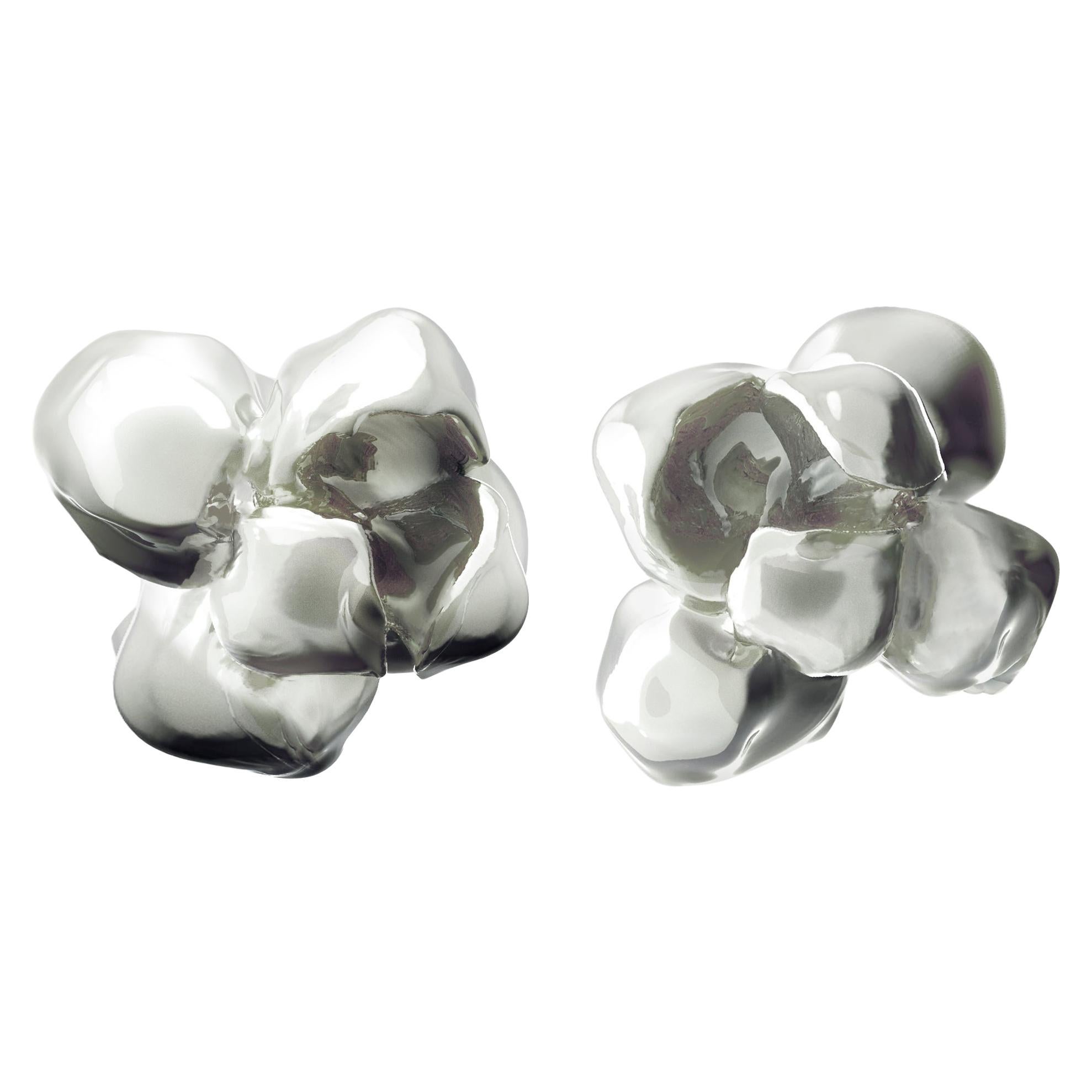 These earrings are made of sterling silver. German actress Anne Ratte-Polle selected these contemporary earrings to complement her stage outfit when she received the Bavarian Film Award.

The sculptural design of the earrings showcases an exquisite
