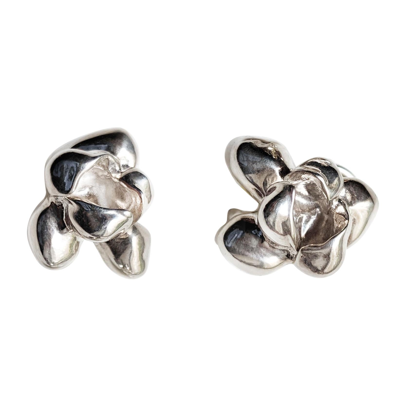 These Iris Blossom contemporary cocktail stud earrings are limited edition many-in-one transformer earrings. It was chosen for the stage outfit by the german actress Anne Ratte-Polle, when she was receiving the Bavarian Film award. The sculptural