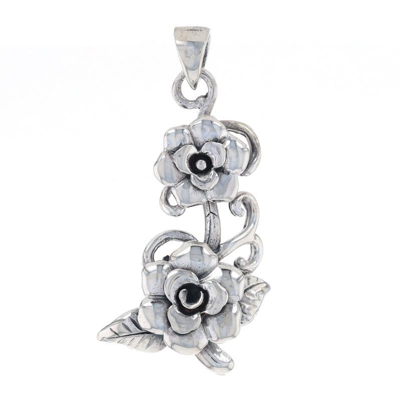 Metal Content: Sterling Silver

Theme: Flower Blossoms, Botanical

Measurements

Tall (from stationary bail): 1 7/16