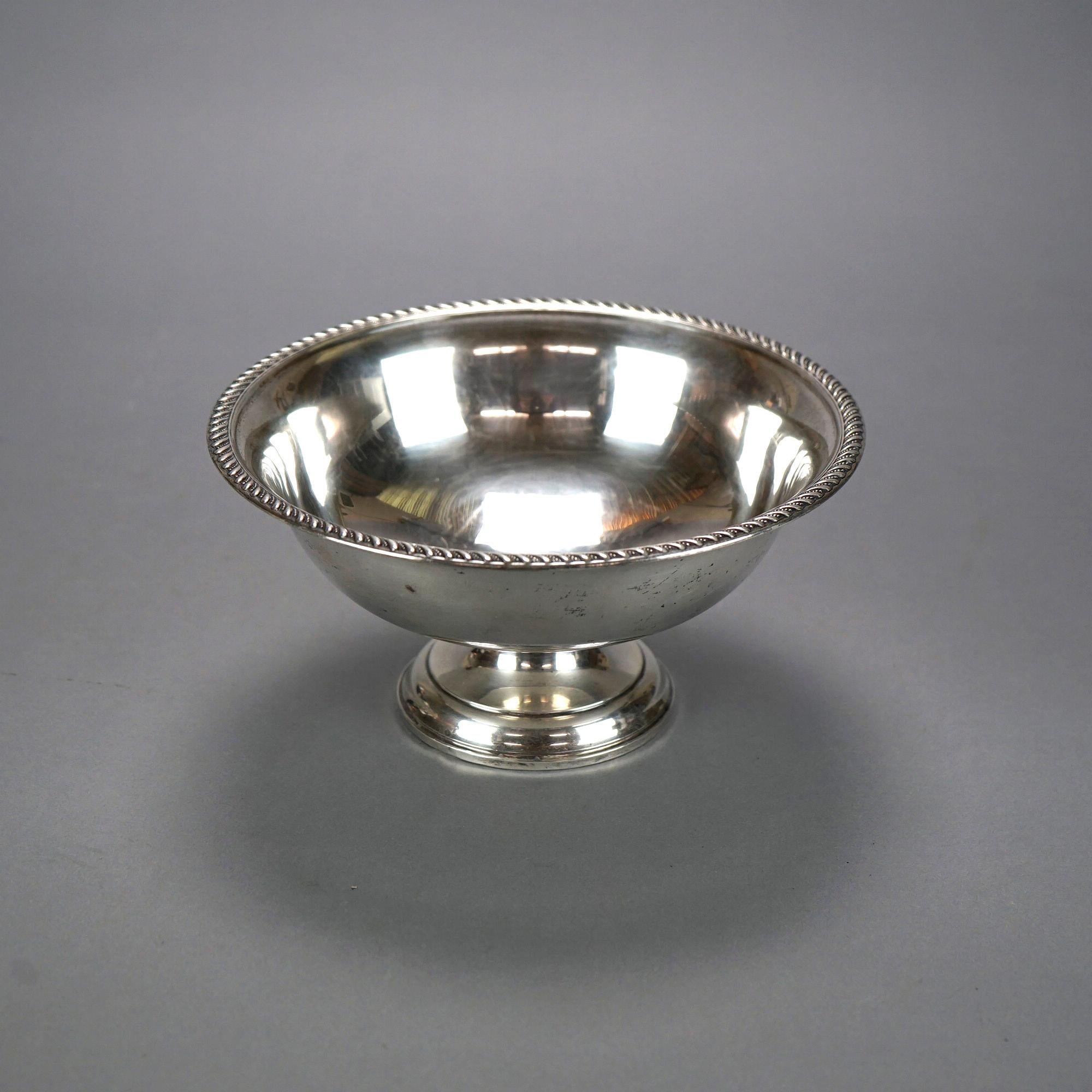 A sterling silver weighted fruit bowl with gadrooned rim, stamped as photographed, 20th century.

Measures- 4.25''H x 8.25''W x 8.25''D.