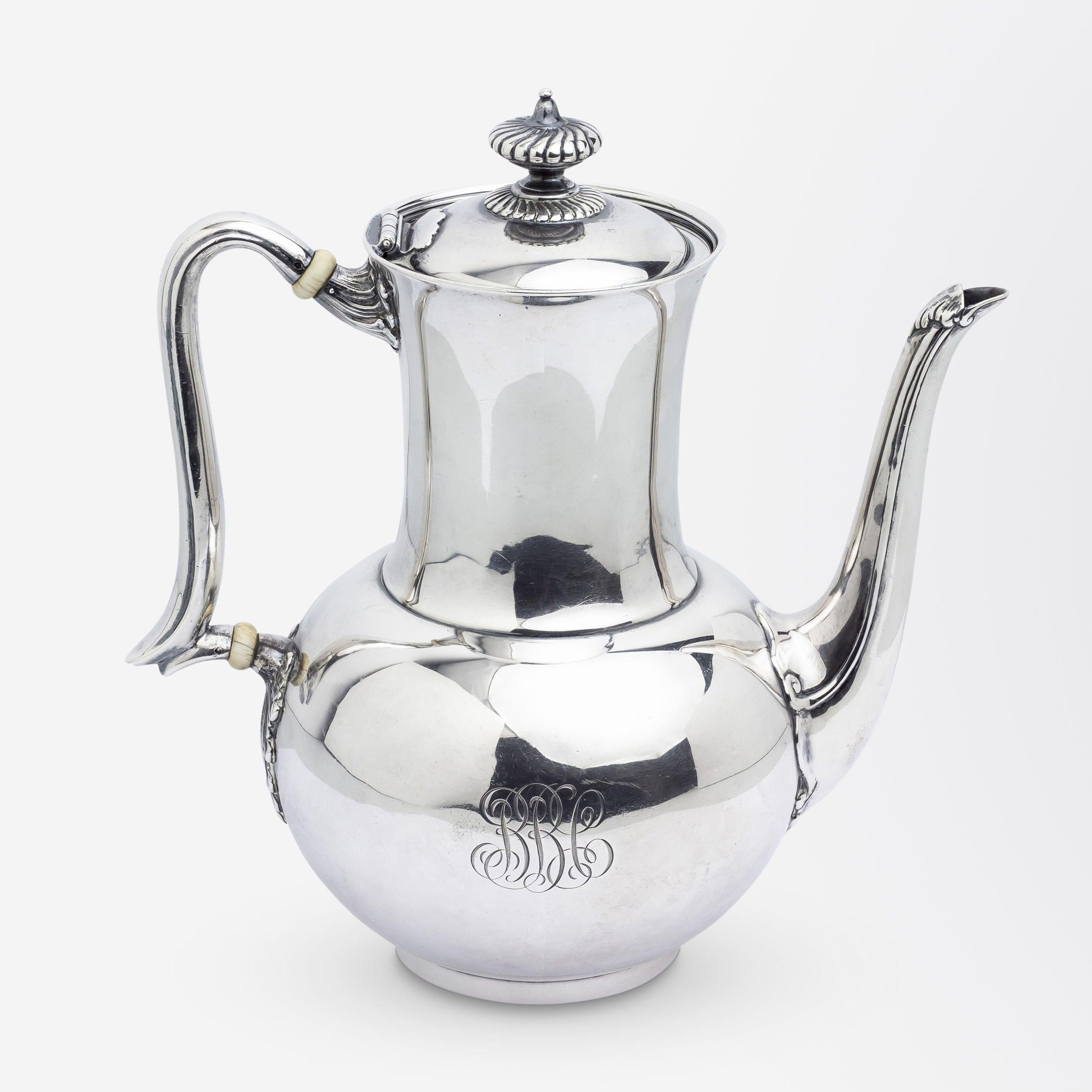 This four piece tea and coffee set was made by the American jewellery and silversmithing firm Tiffany & Company. The service comprises a coffee pot, a teapot, lidded sugar pot and a creamer, all crafted from sterling silver with ivory 'insulators'