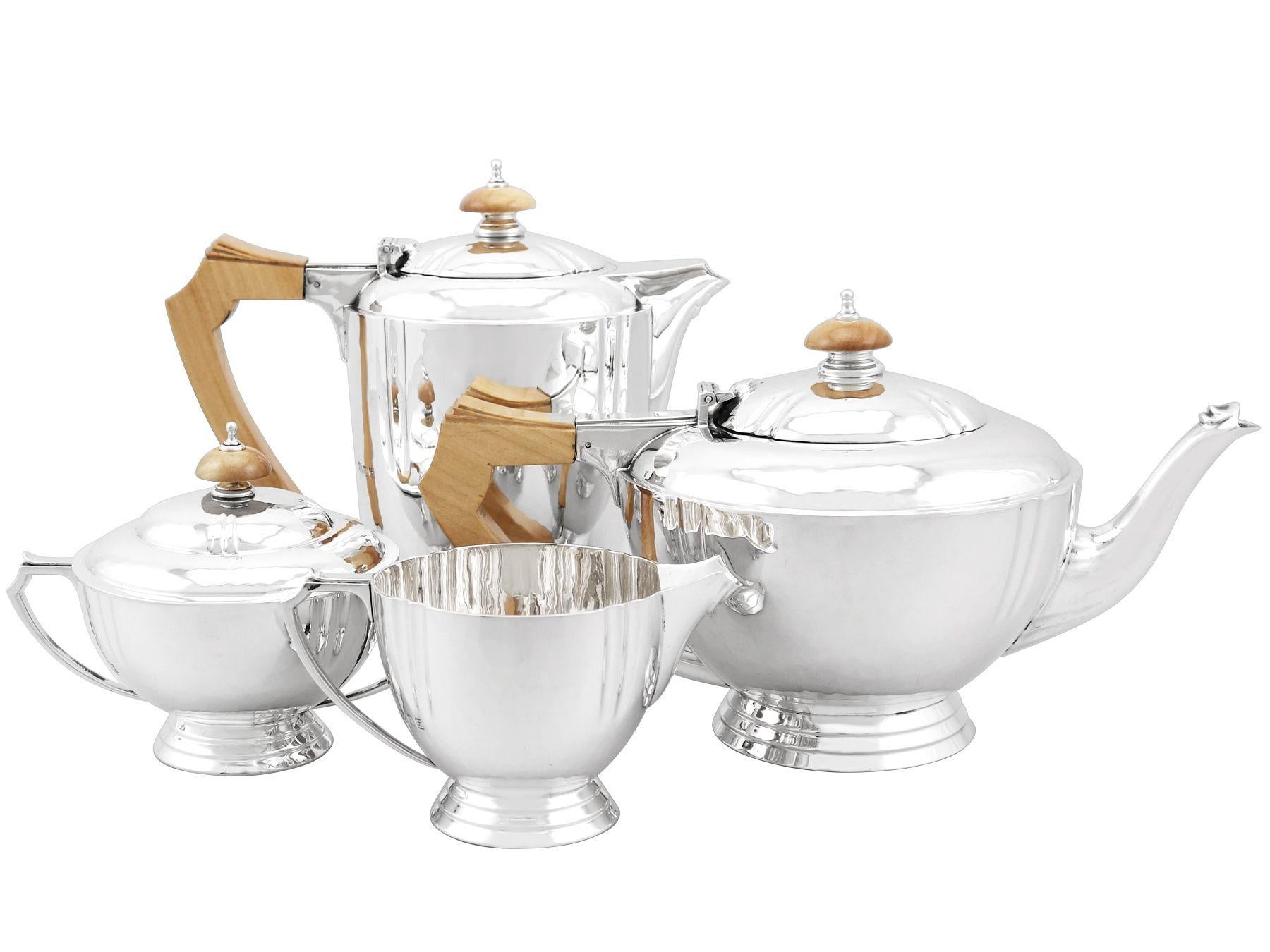 An exceptional, fine and impressive vintage George VI English sterling silver four piece tea and coffee set and matching tray; an addition to our silver teaware collection.

This exceptional vintage George VI sterling silver four piece tea and