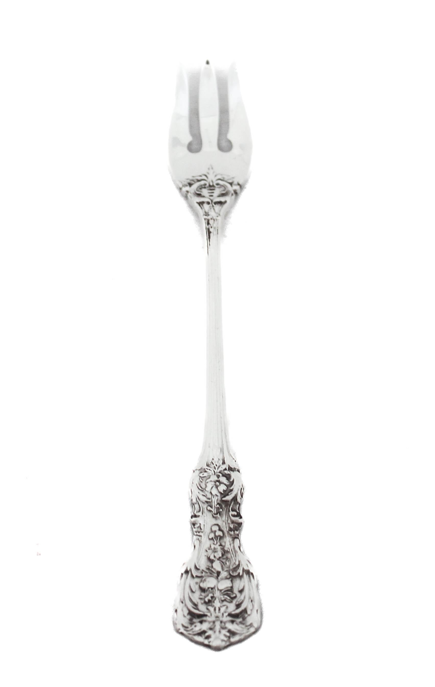 Being offered is a pair of sterling silver pickle (seafood) forks in the Francis I pattern.  First introduced in 1907 by Reed and Barton, Francis I quickly became their best known pattern.  Francis I flatware was so popular that R&B started making