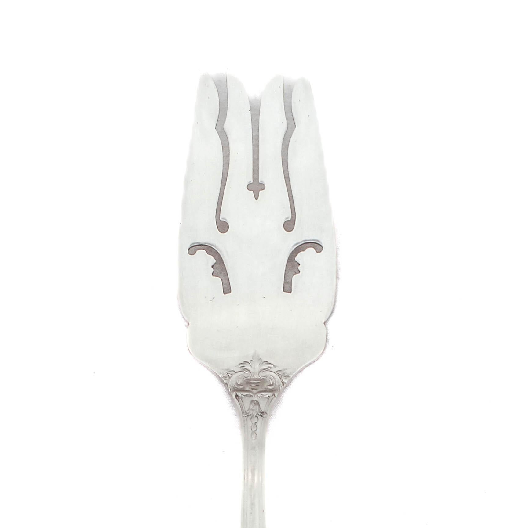 Being offered is a sterling silver serving fork in the Francis I pattern by Reed & Barton.  Francis I is one of, if not the most famous flatware pattern ever made.  It’s definitely Reed and Barton’s all time bestselling pattern.  With its rich and