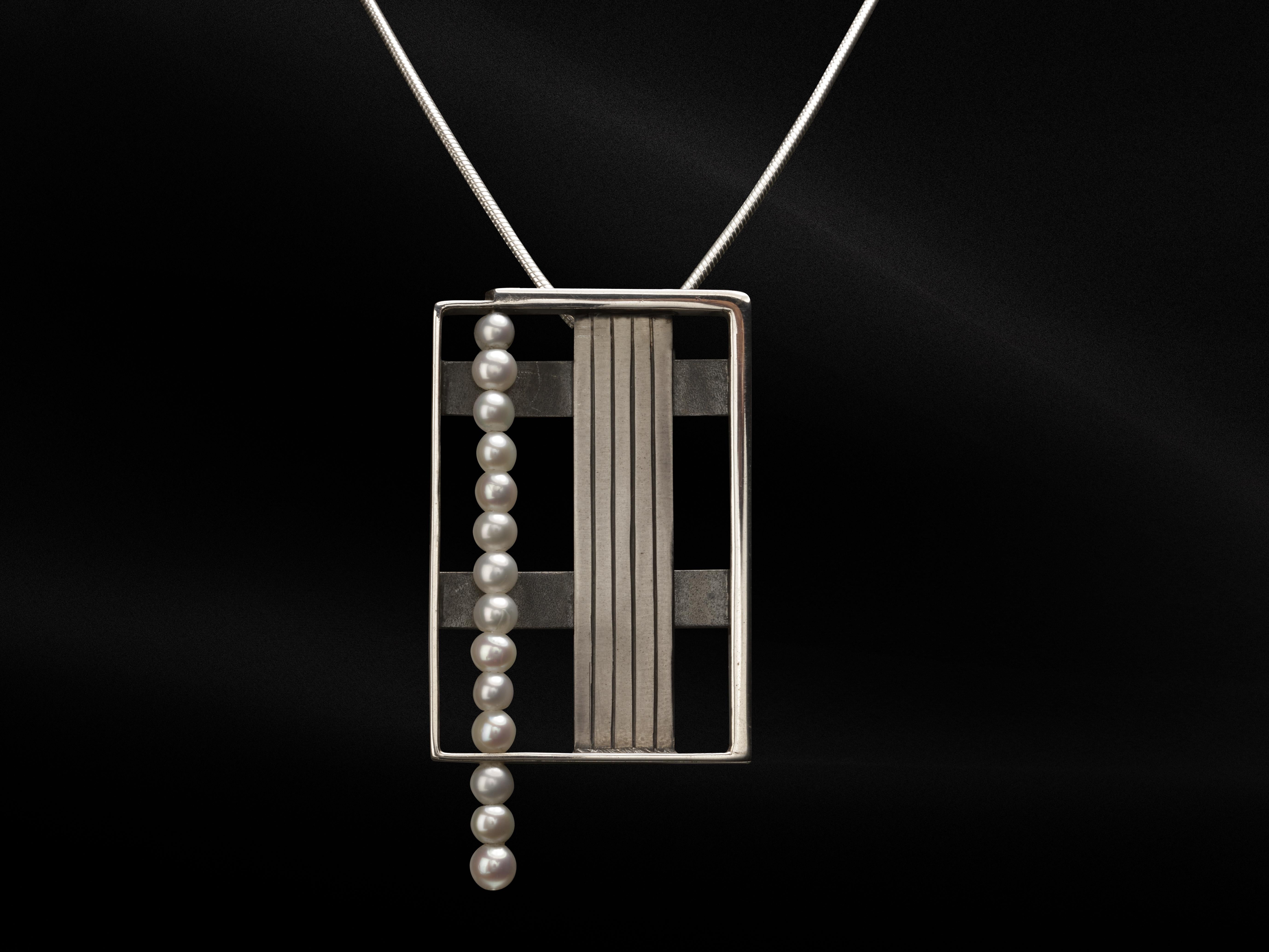 Contemporary Sterling Silver and Freshwater Pearl Sculptural minimalist Pendant For Sale