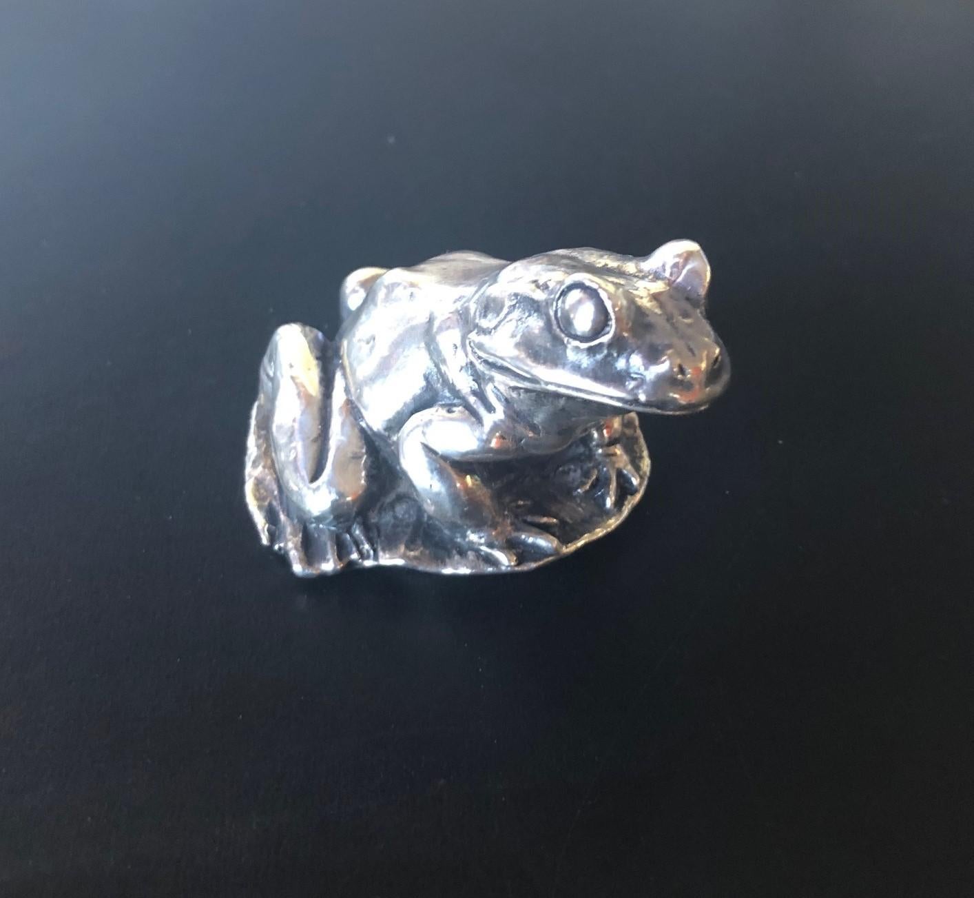 toad with silver teeth