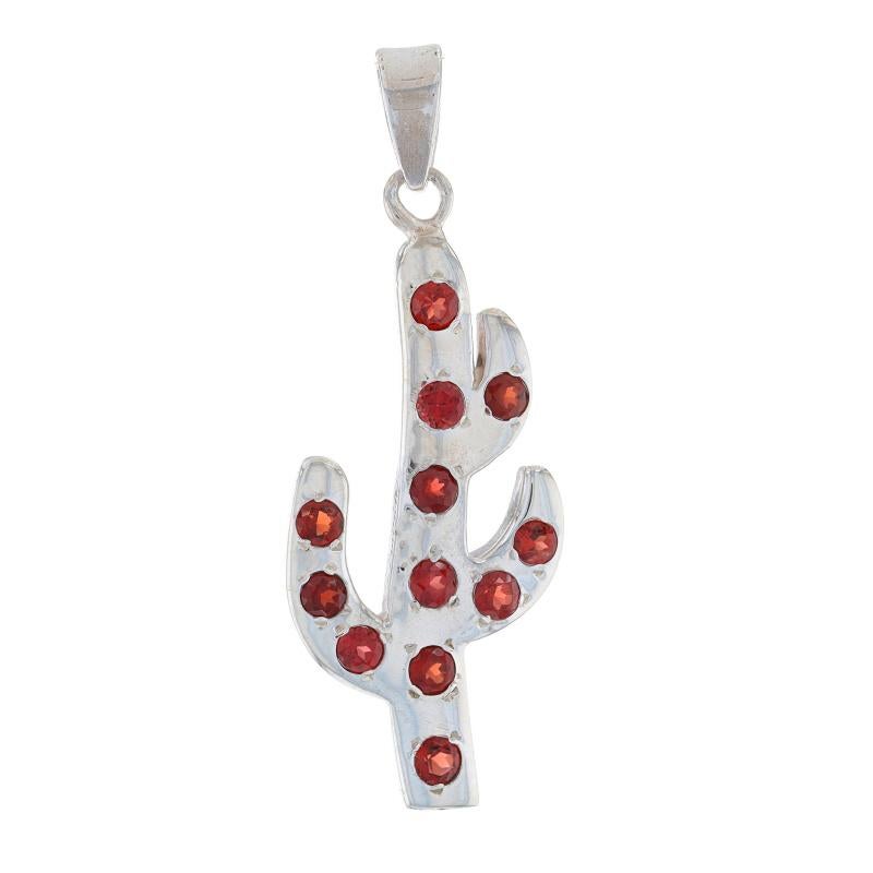 Metal Content: Sterling Silver

Stone Information
Natural Garnets
Carat(s): 1.56ctw
Cut: Round
Color: Red

Total Carats: 1.56ctw

Theme: Cactus, Desert Plant

Measurements
Tall (from stationary bail): 1 23/32
