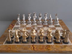 Sterling silver, gilt and onyx chess set with board