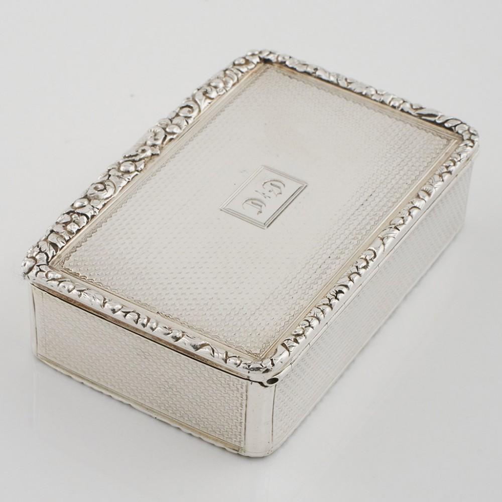 Heading : Sterling silver table snuff box
Date : Hallmarked in London in 1821 for Charles Rawlings
Period : George IV
Origin : London, England
Decoration : The body of the box is embellished with exceptional tooled decoration with the rim of the
