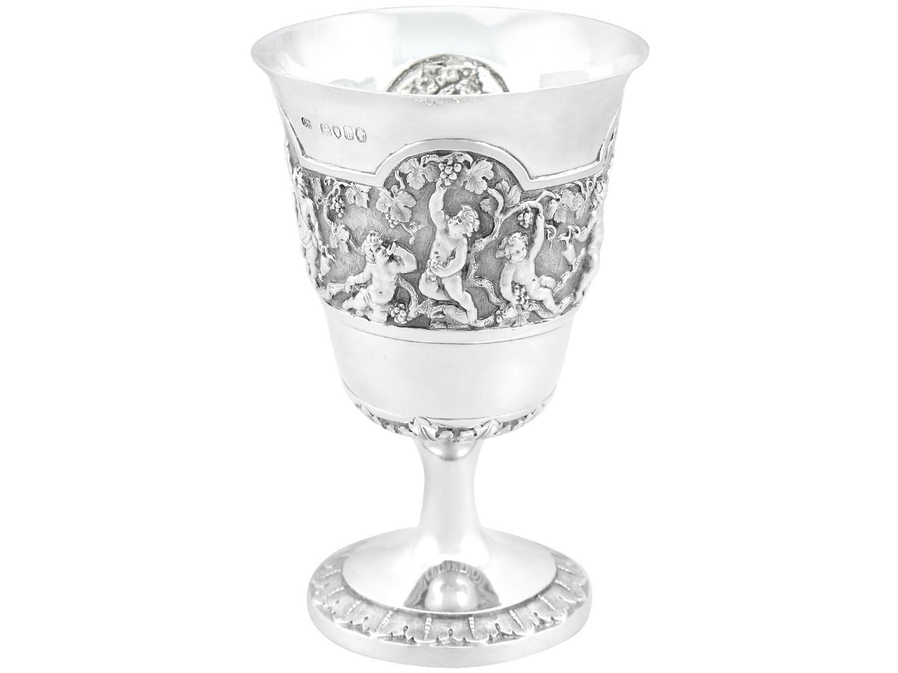 An exceptional, fine and impressive antique Victorian English sterling silver goblet made by George Adams; an addition to our collection of wine and drinks related silverware 

This exceptional antique Victorian sterling silver goblet has a