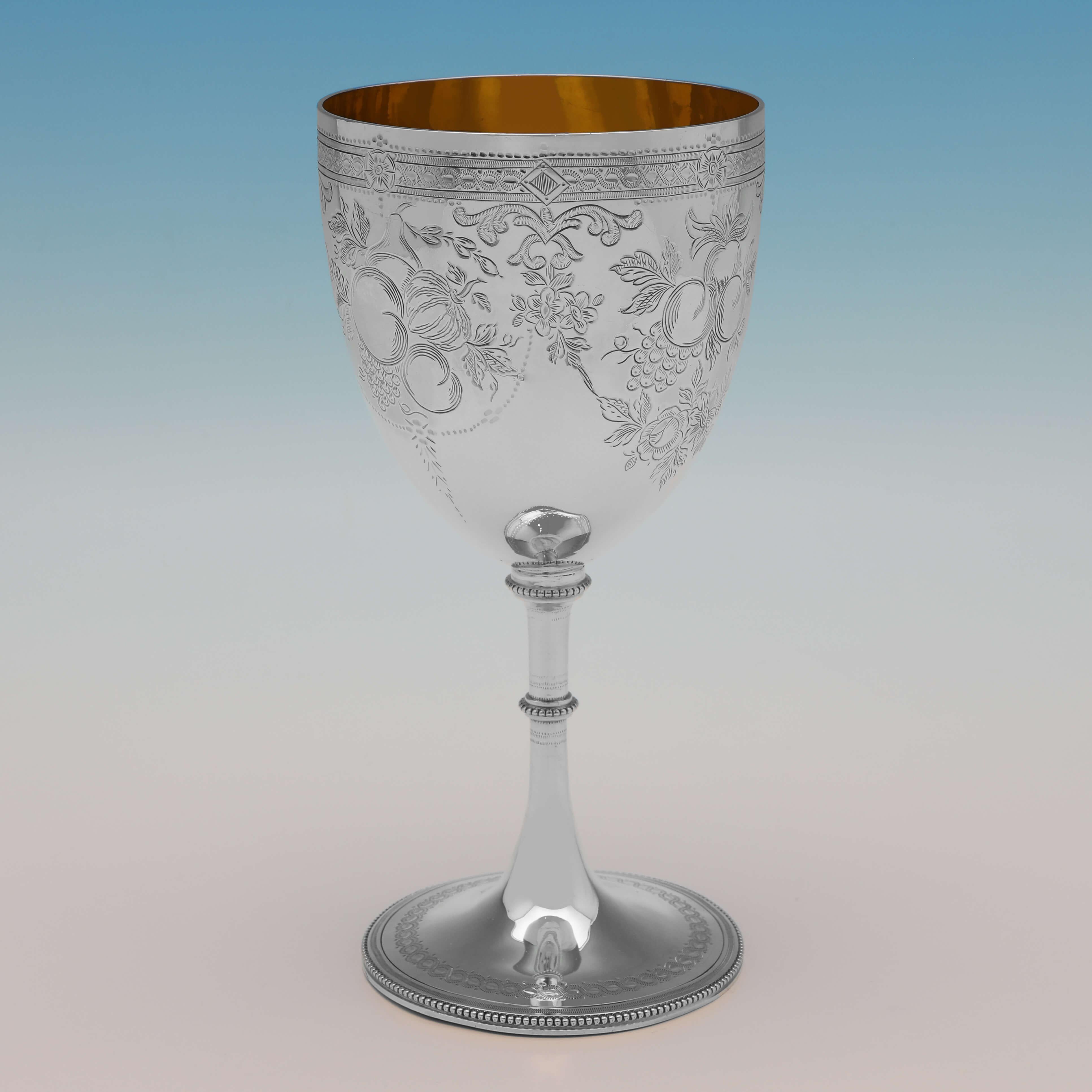 Hallmarked in London in 1863 by Augustus George Piesse, this very attractive, Antique Sterling Silver Goblet, features brightcut engraved decoration throughout, a gilt interior and an engraved presentation inscription. The goblet measures 7.5