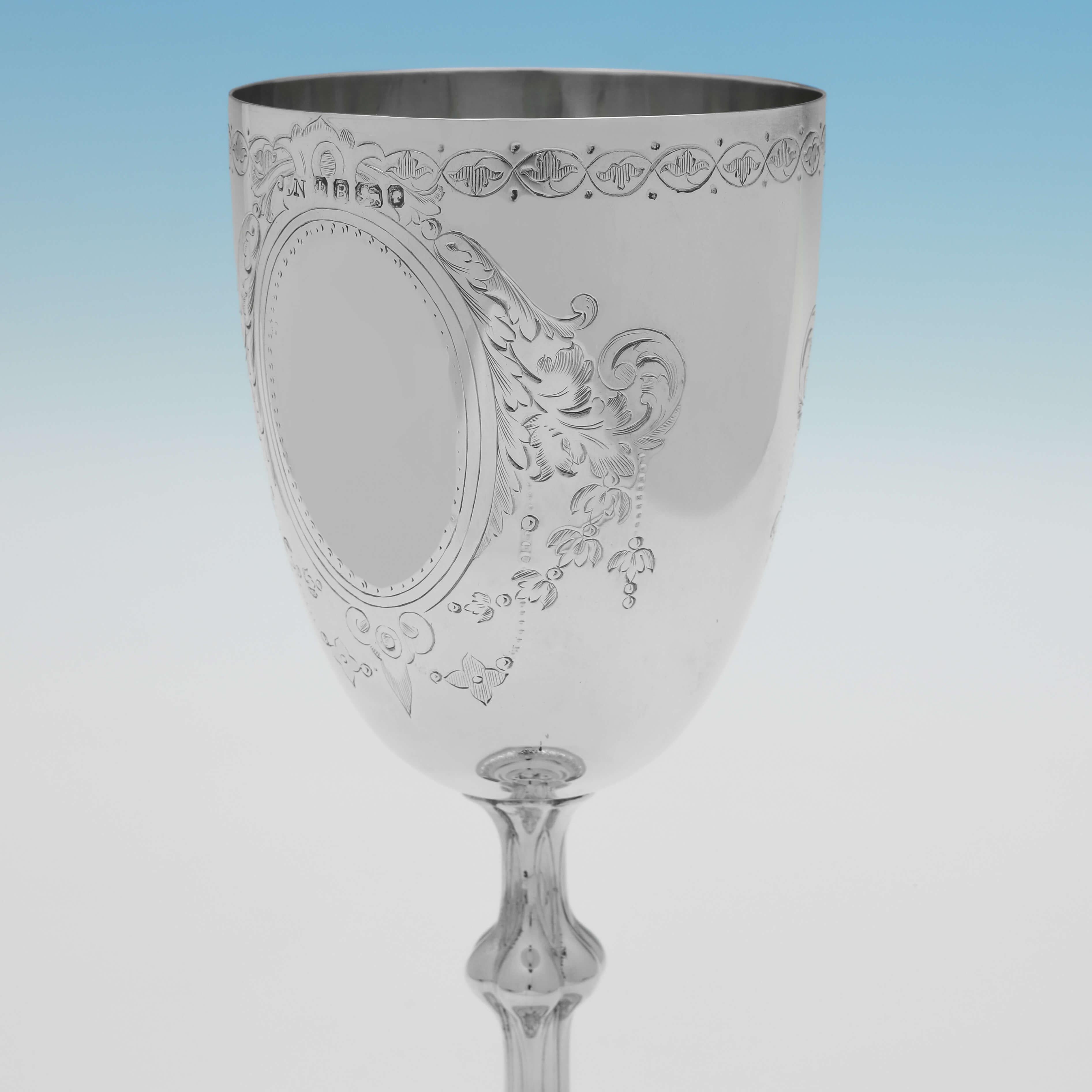 Hallmarked in Sheffield in 1869, this very attractive, Victorian, Antique Sterling Silver Goblet, features a shaped stem and engraved decoration throughout. The goblet measures 7.25