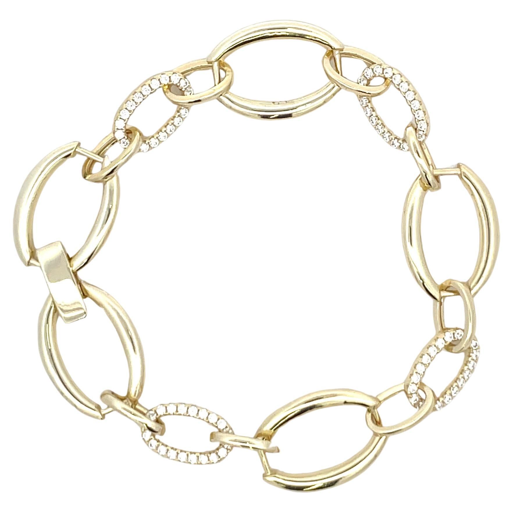 Gold plated sterling silver bracelet featuring high polished and cubic zirconia links with a fold-over clasp. 
Great quality, will never tarnish! 