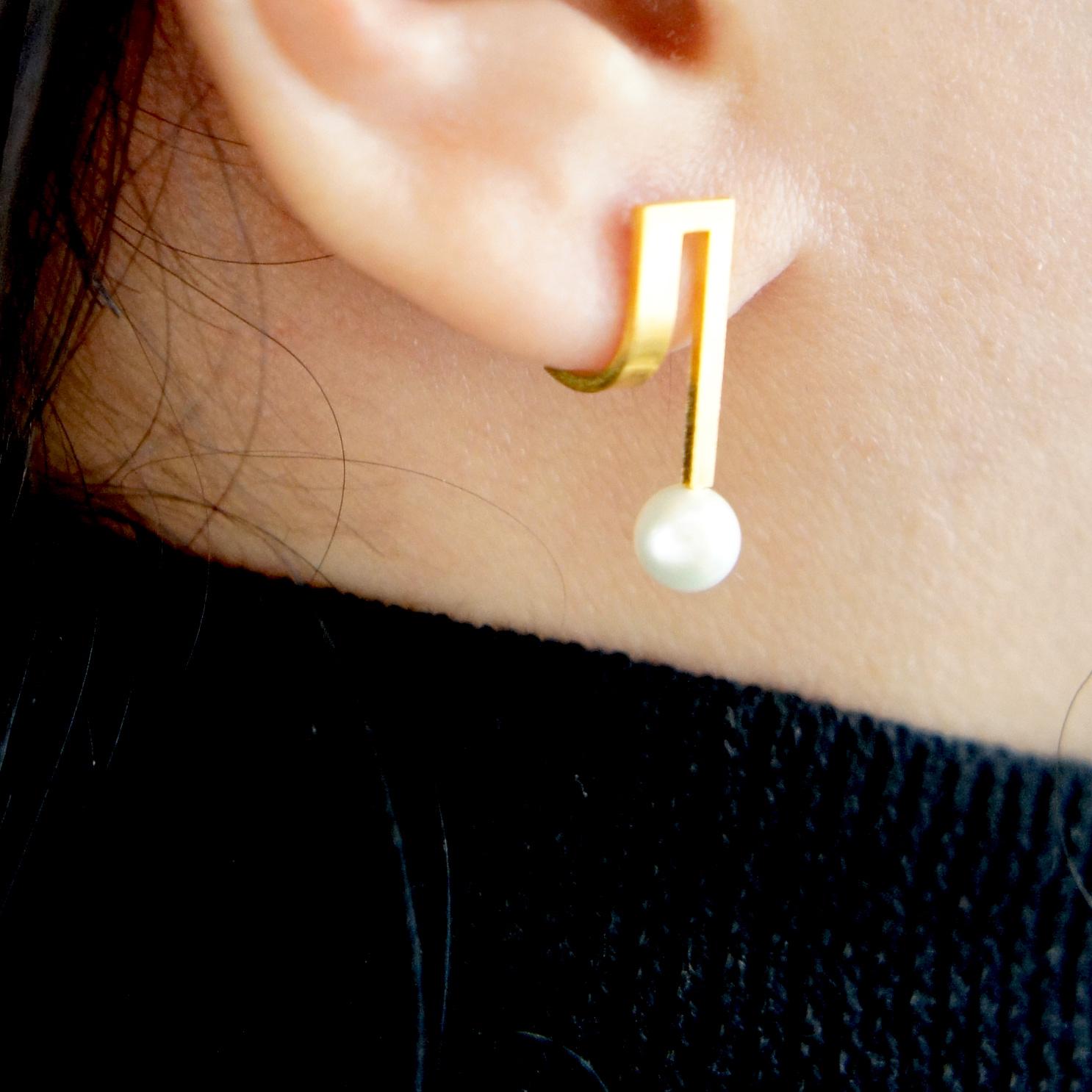 Artisan Sterling Silver Gold-Plated Curve Dropping Pearl Earrings For Sale