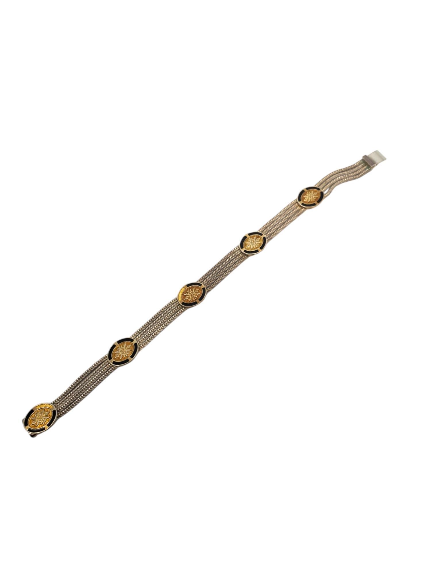 Sterling Silver & Gold Vermeil Multi Strand Foxtail Station Bracelet-

This vintage multi strand bracelet features 5 gold vermeil & black enamel stations on 4 foxtail chains in sterling silver with a push lock clasp.
Matching earrings #