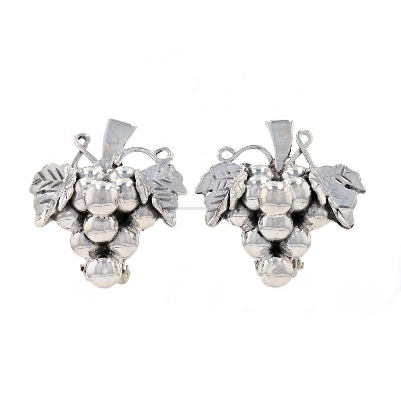 Metal Content: Sterling Silver

Style: Large Stud
Fastening Type: Non-Pierced Clip-On Closures
Theme: Vineyard, Grape Clusters

Measurements
Tall: 1 1/4