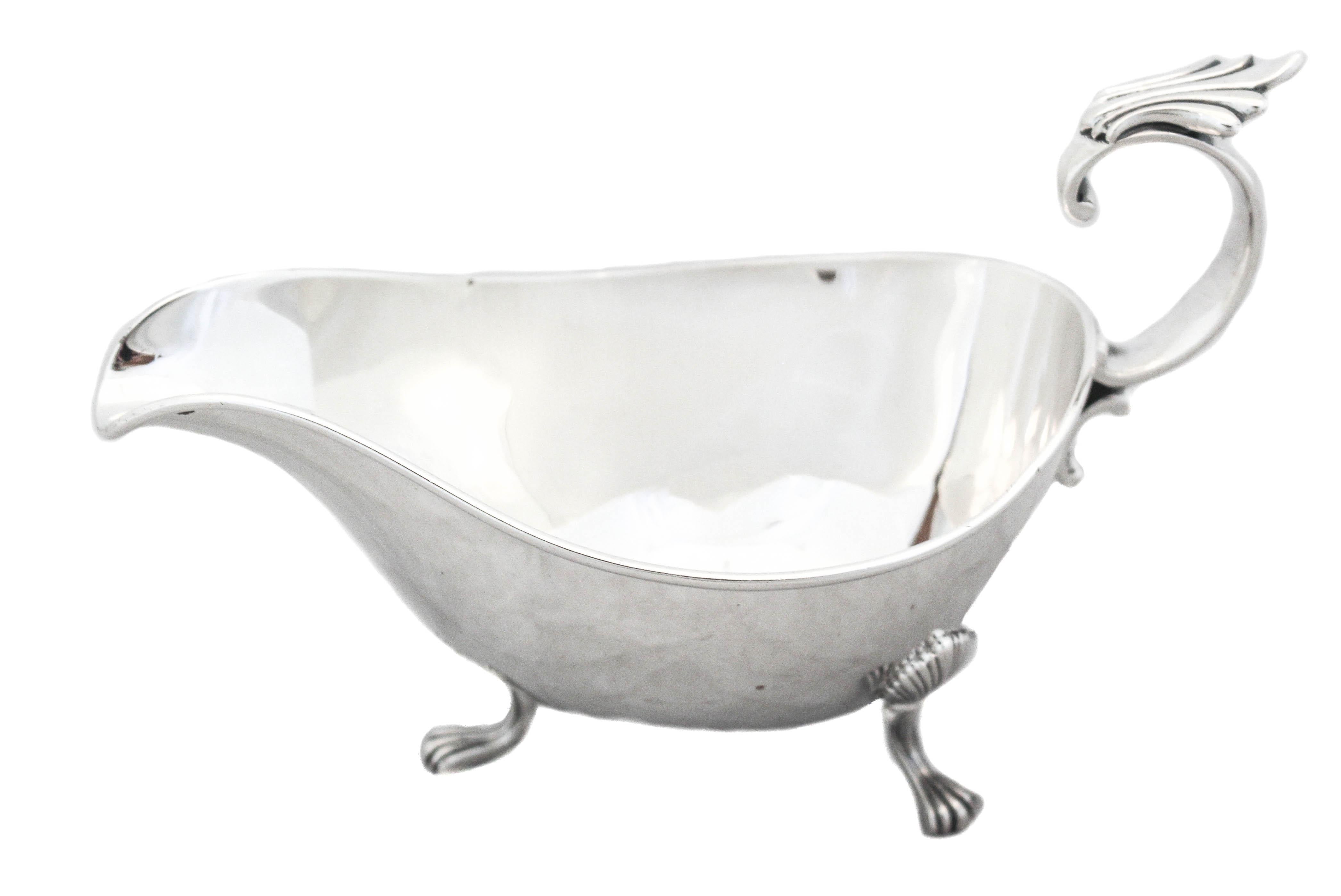 We are happy to offer you this sterling silver gravy boat by Wm. Durgin Silver from the 1940’s.  Manufactured during WWII it is understated and unadorned— a reflection of the time.  Most sterling silver pieces manufactured during that period are