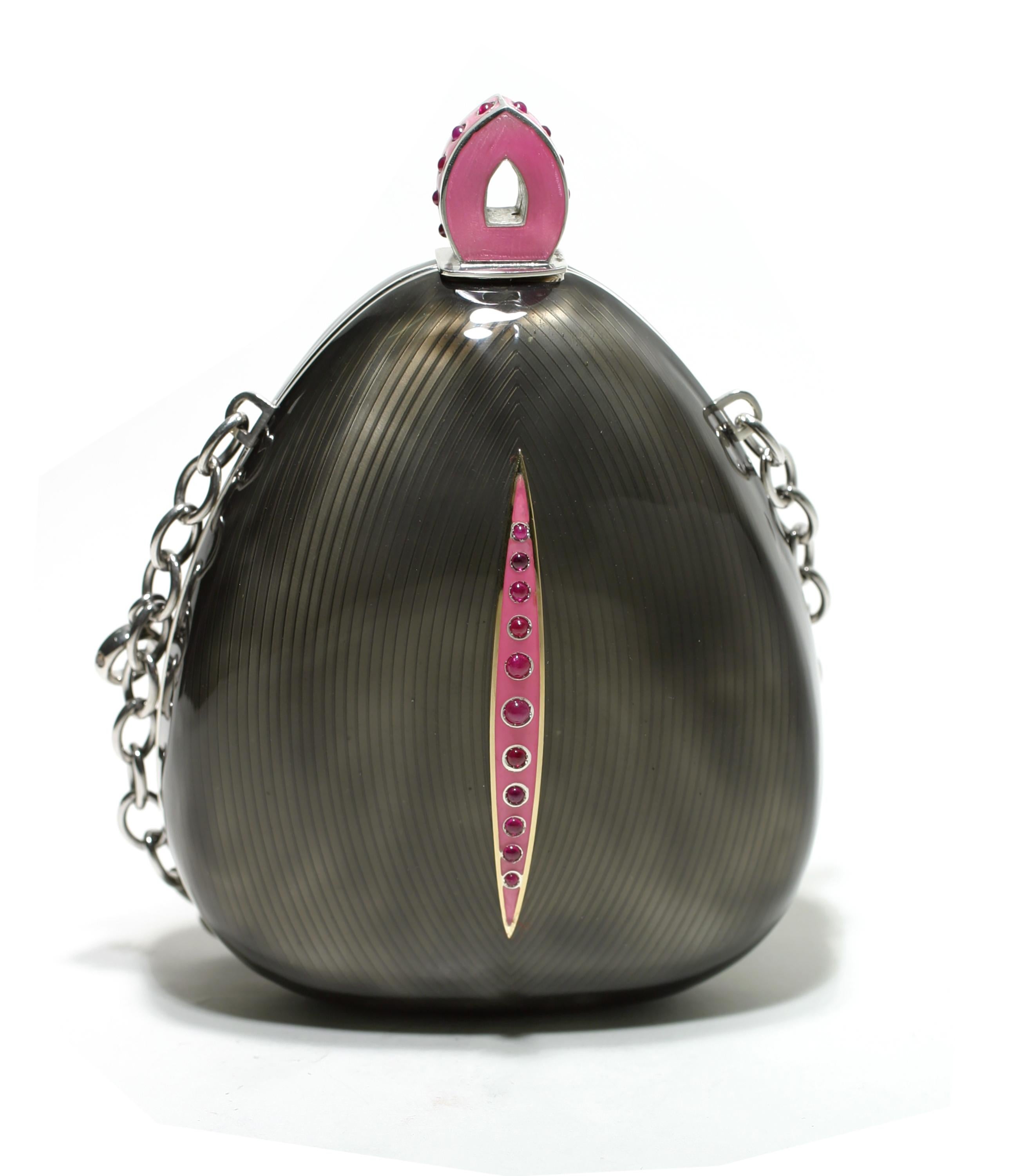 One of a kind, 20th-century sterling silver Guilloché black enamel Minaudière
Cabochon rubies weighing 4.55 carats
11