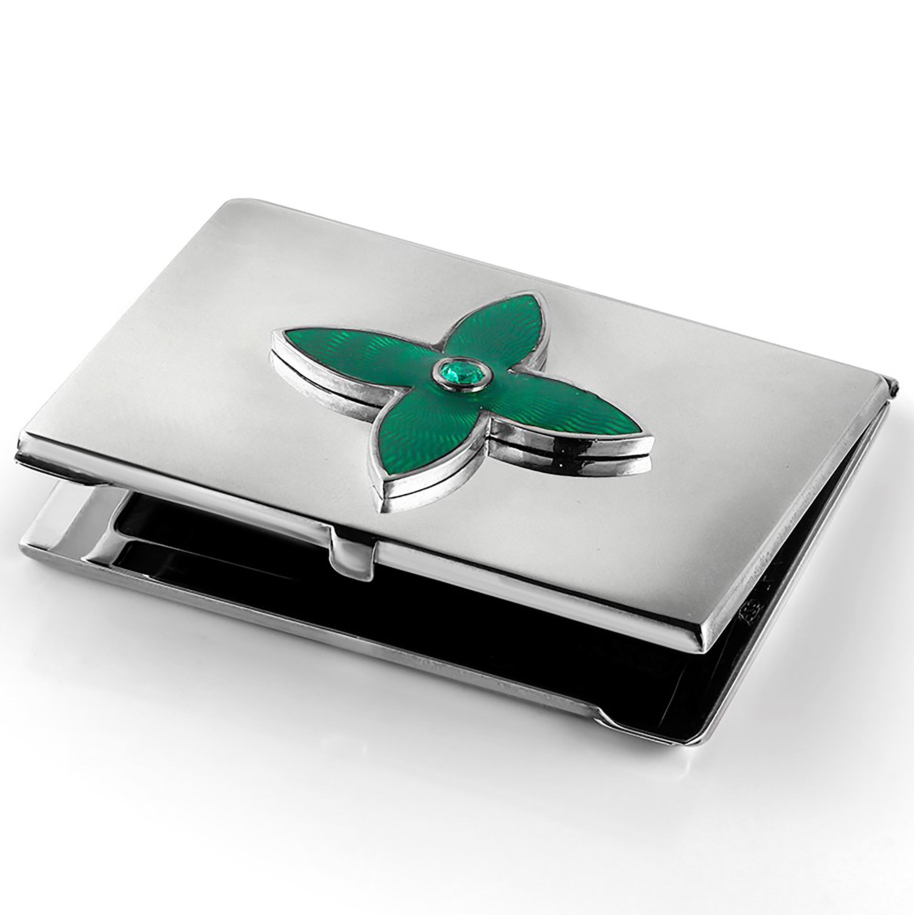 20th-century sterling silver Guilloché green enamel card case
Round emerald weighing 0.35 carats
Handmade in Italy
The Ocie Minaudiere collection was created to incorporate precious gemstones into evening luxury Minaudière
Ocie's Minaudière