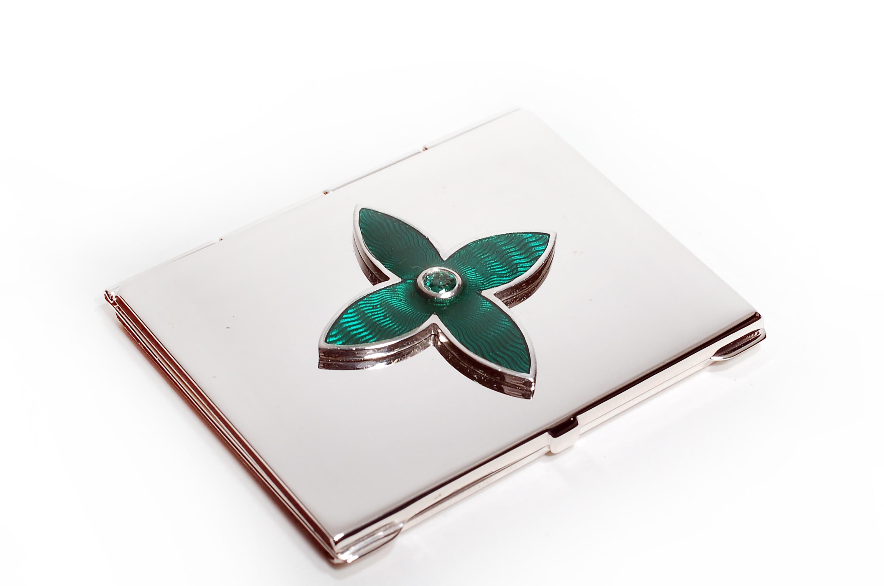 20th-century sterling silver Guilloché blue enamel picture frame case
Round emerald weighing 0.40 carats
Handmade in Italy
The Ocie Minaudiere collection was created to incorporate precious gemstones into evening luxury Minaudière
Ocie's Minaudière