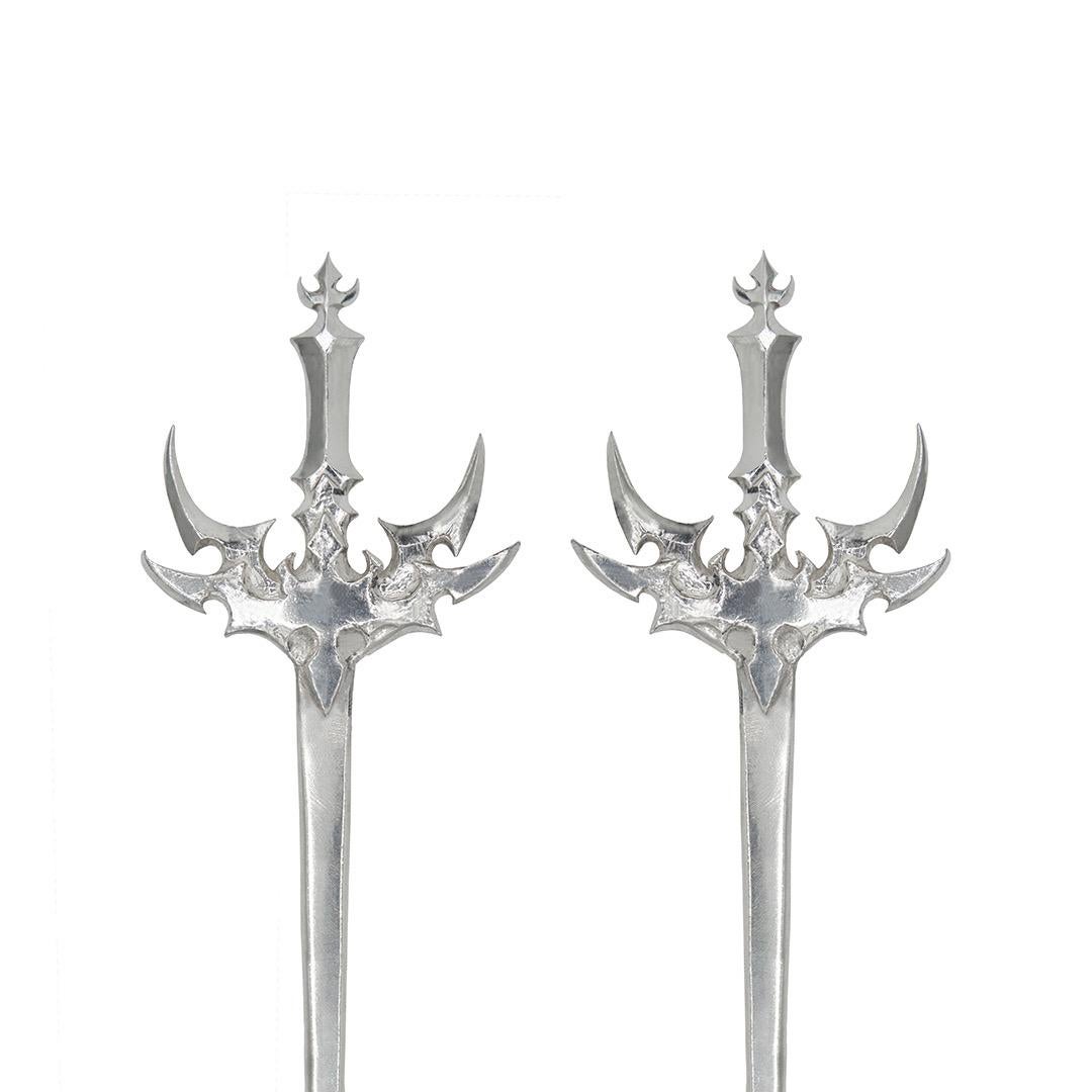 This pair of of sterling silver hair pins was made using lost wax casting and fabrication and are finished with a deep high polish brushed look.

They measure approximately 9