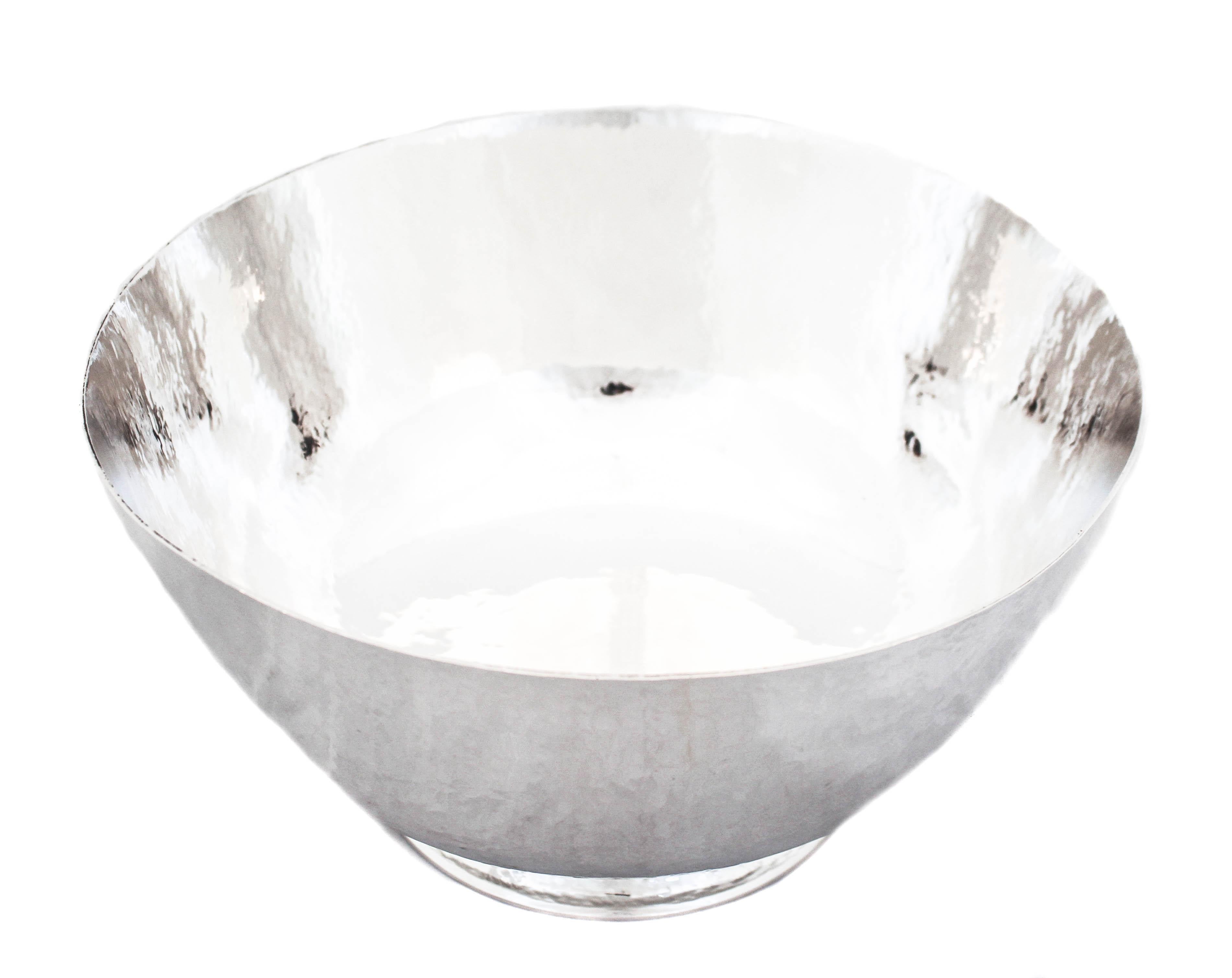 We are delighted to offer you this sterling silver hand hammered bowl by J. C. Boardman & Company of Wallingford Connecticut. This large bowl can definitely be used as a centerpiece. It stands on a pedestal and has a presence. It can even be used as