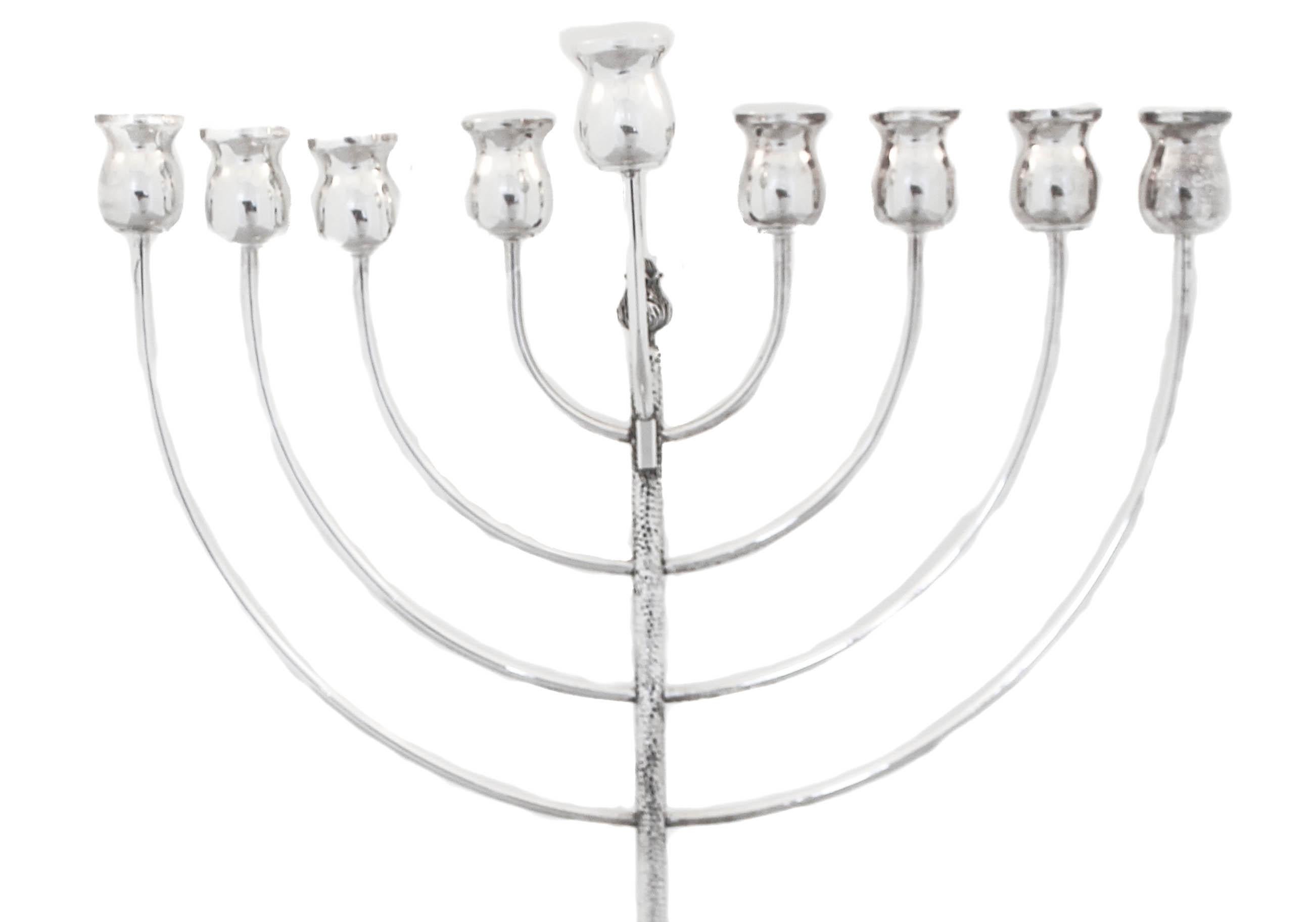 Just in time for Hanukkah 2023, this stunning menorah! Sterling silver and uber-modern, this menorah is a show stopper.  It has a hammered finish and a contemporary design.  Bring in the holidays with this beautiful silver menorah.