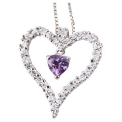 Ciondolo con zaffiro penzolante in cornice a cuore in argento 925 con catenina da 16".