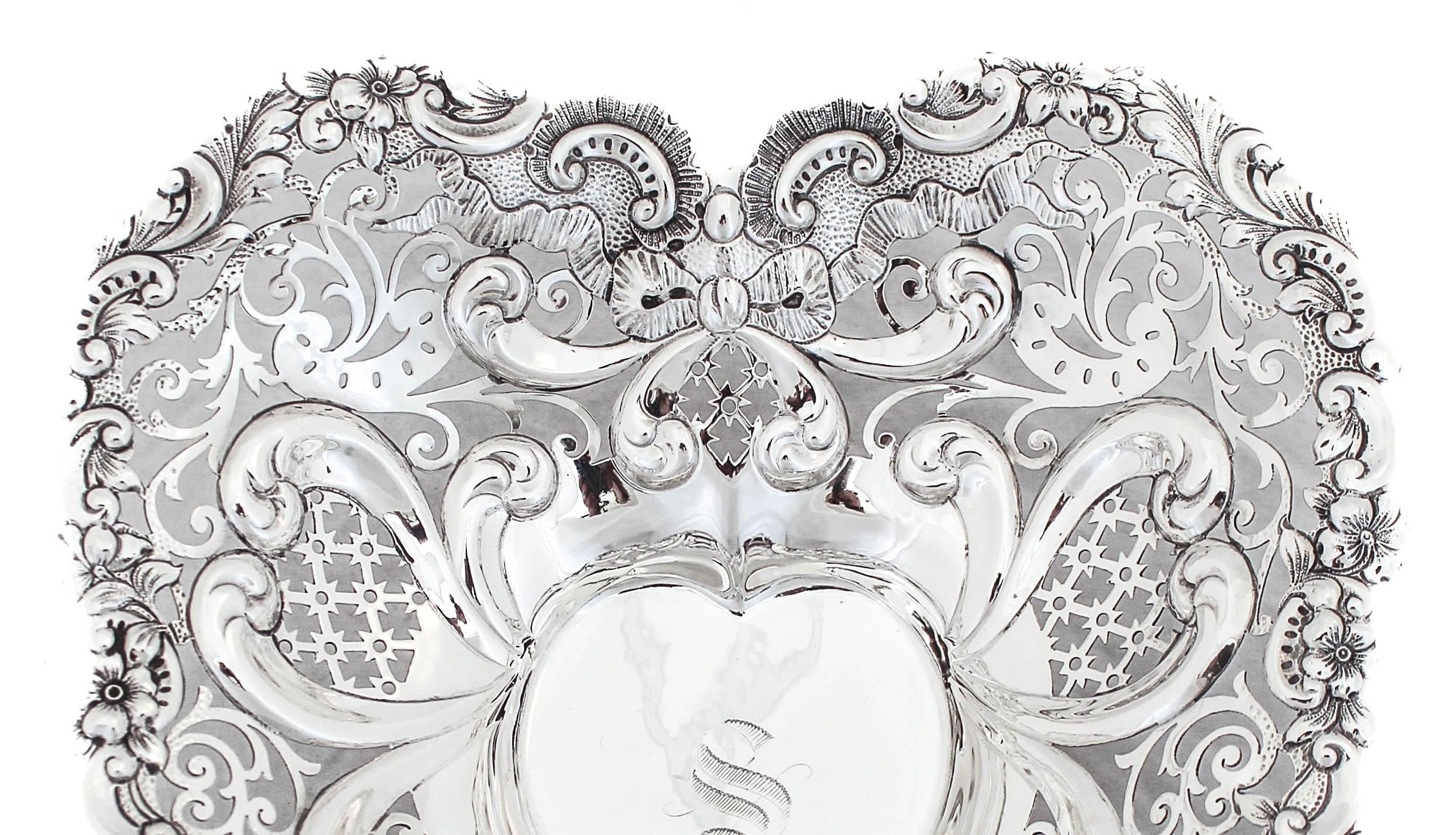 Being offered is a heart shaped dish made by Gorham Silversmiths of Providence, Rhode Island and hallmarked 1893 (one hundred and thirty one years old)!!  It has rich, old-world grace with its reticulated work and elaborate floral pattern.  It
